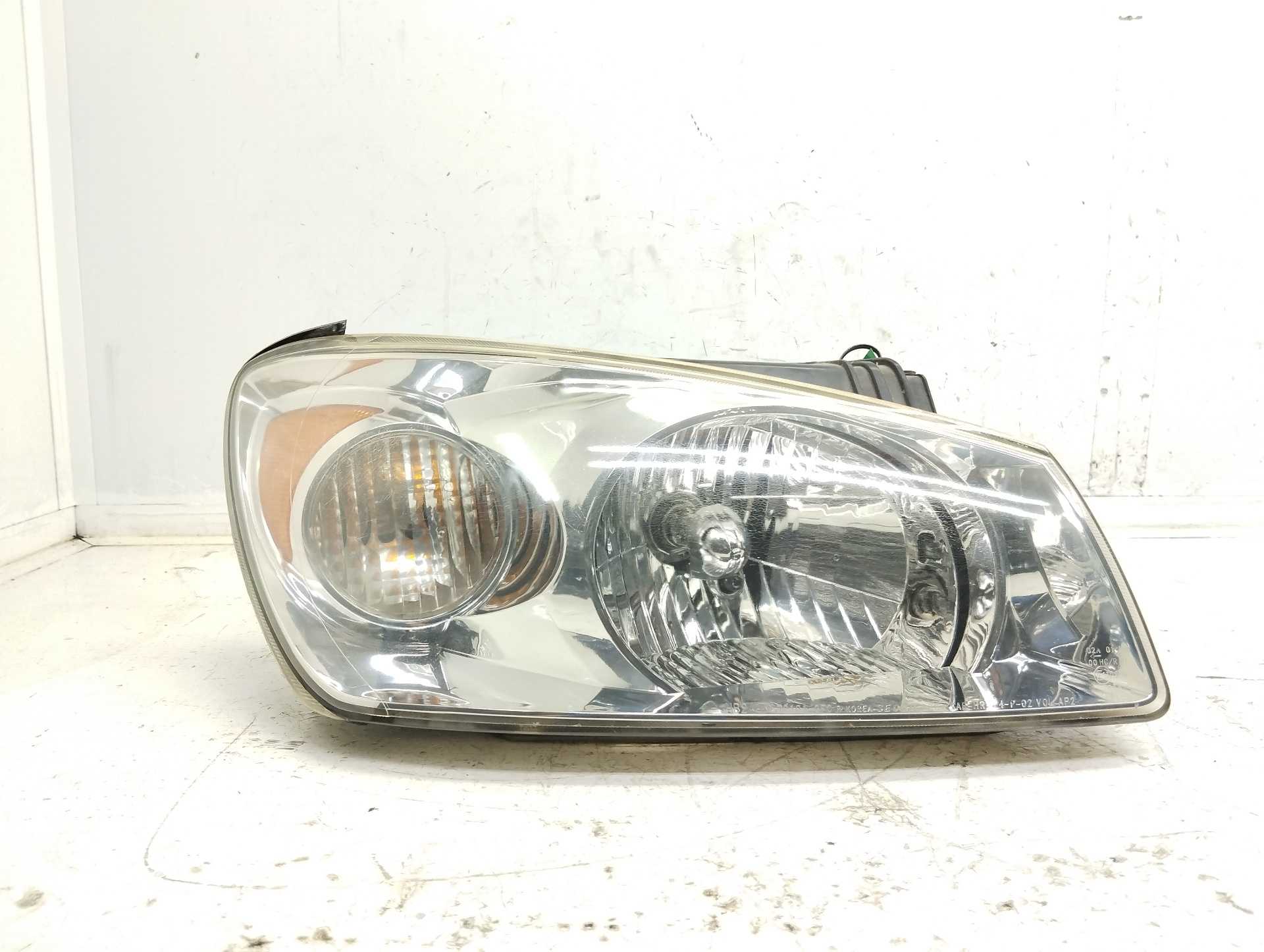 Recambio de faro derecho para kia cerato 2.0 ex crdi berlina (4-ptas.) referencia OEM IAM 921012F0  