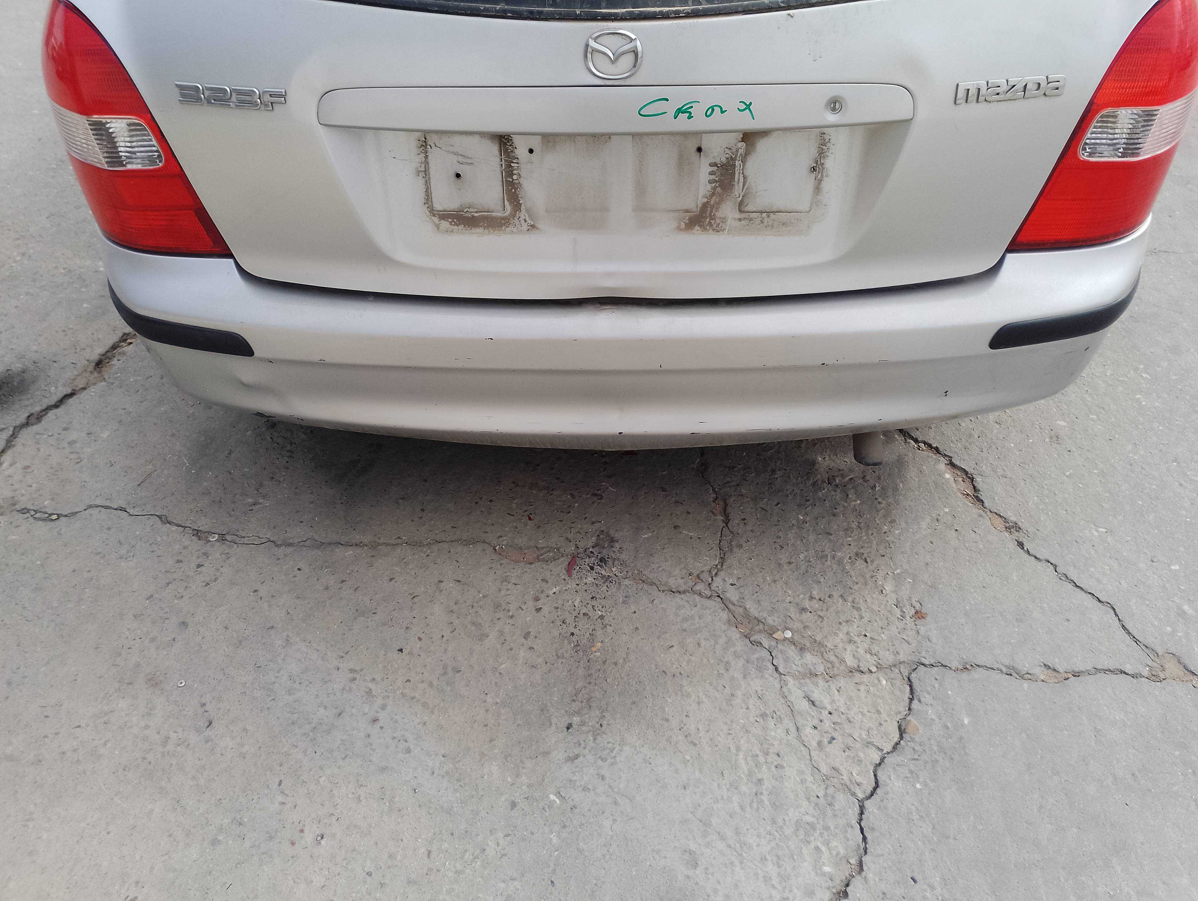 Recambio de paragolpes trasero para mazda 323 berlina f/s (bj) 2.0 d f glx referencia OEM IAM   