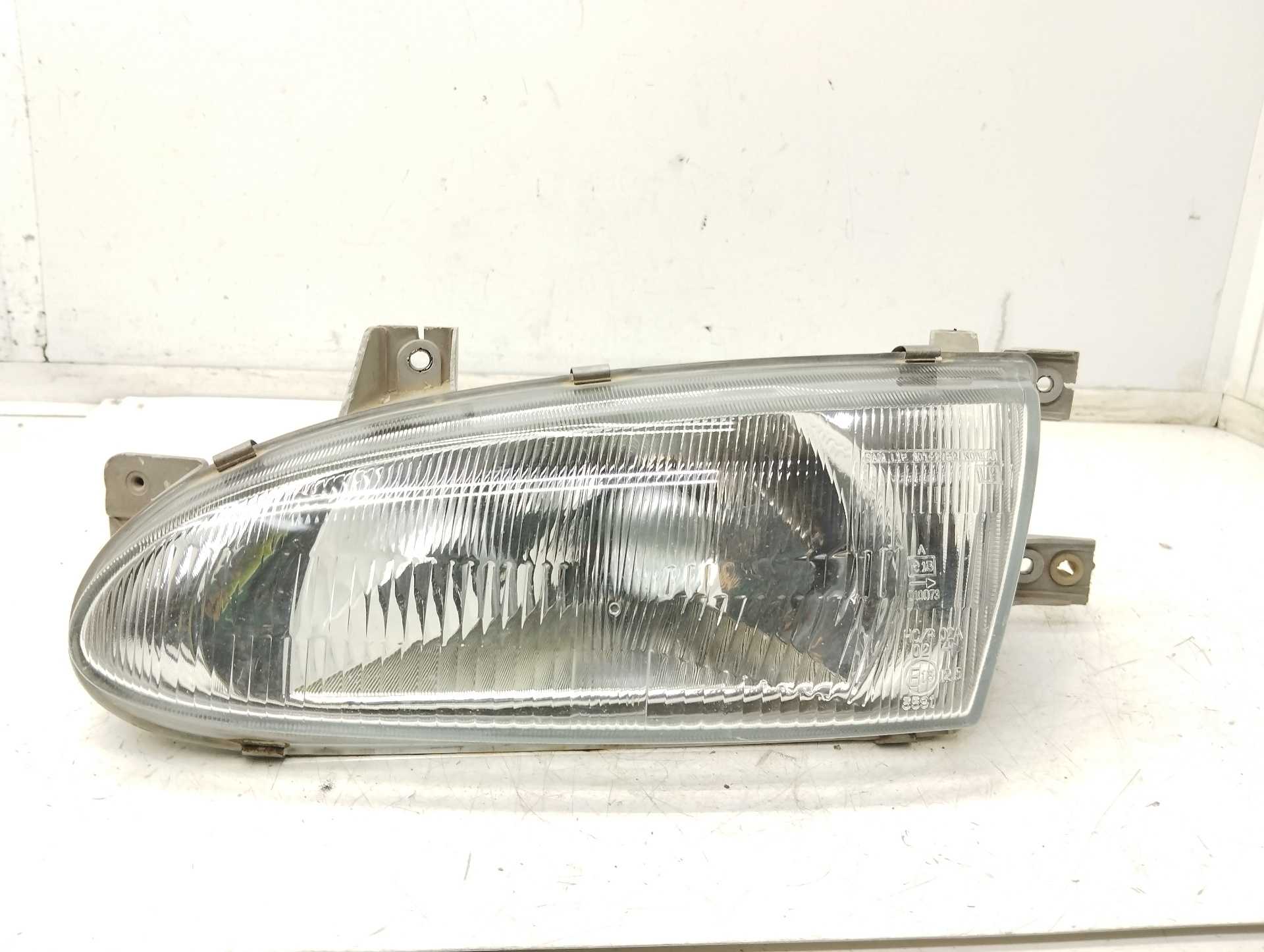 Recambio de faro izquierdo para hyundai accent (x3) 1.5 12v cat referencia OEM IAM E13010073  