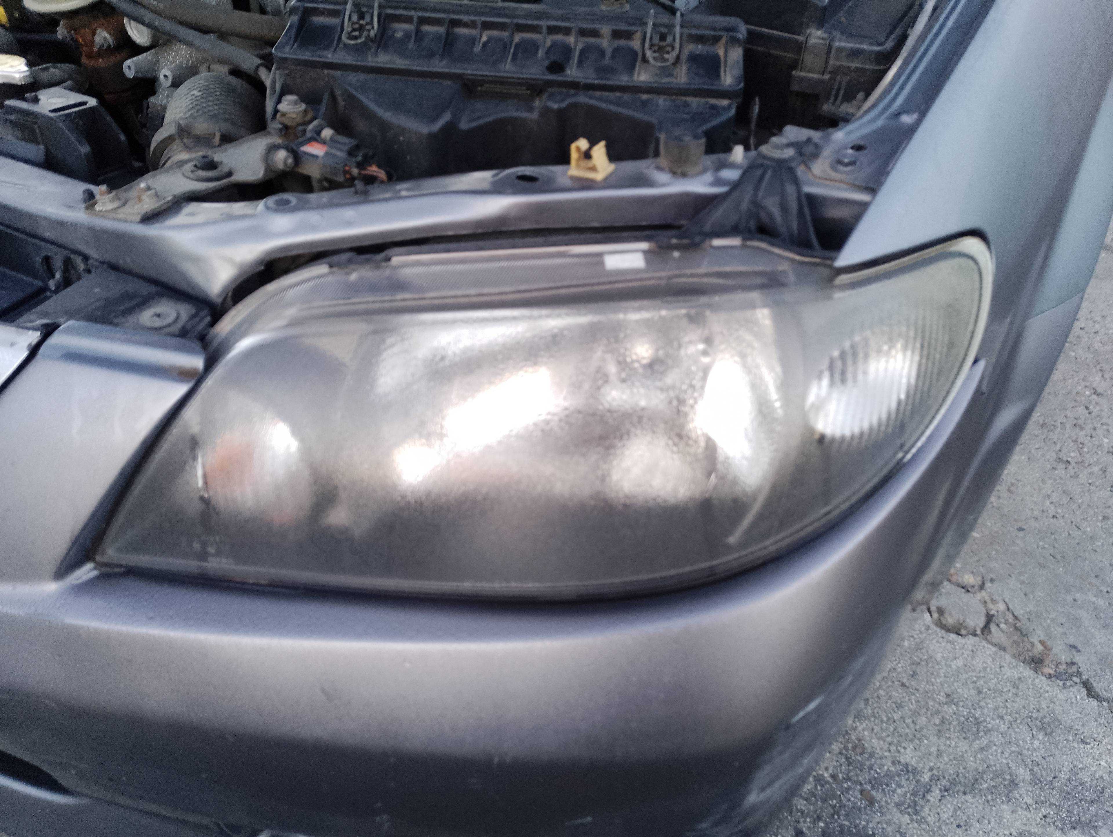 Recambio de faro izquierdo para mazda 323 berl. f/s (bj) 2.0 d s exclusive referencia OEM IAM   