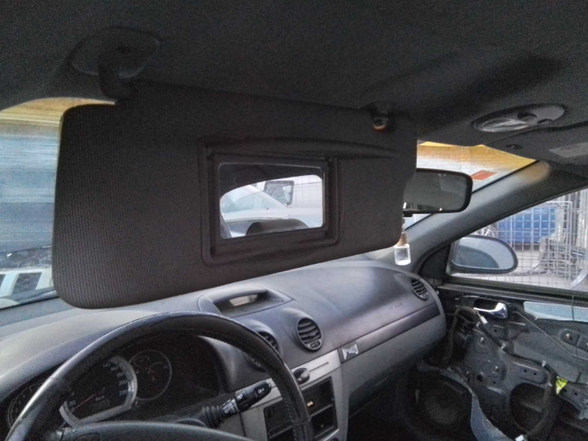 Recambio de parasol izquierdo para chevrolet lacetti cdx referencia OEM IAM   