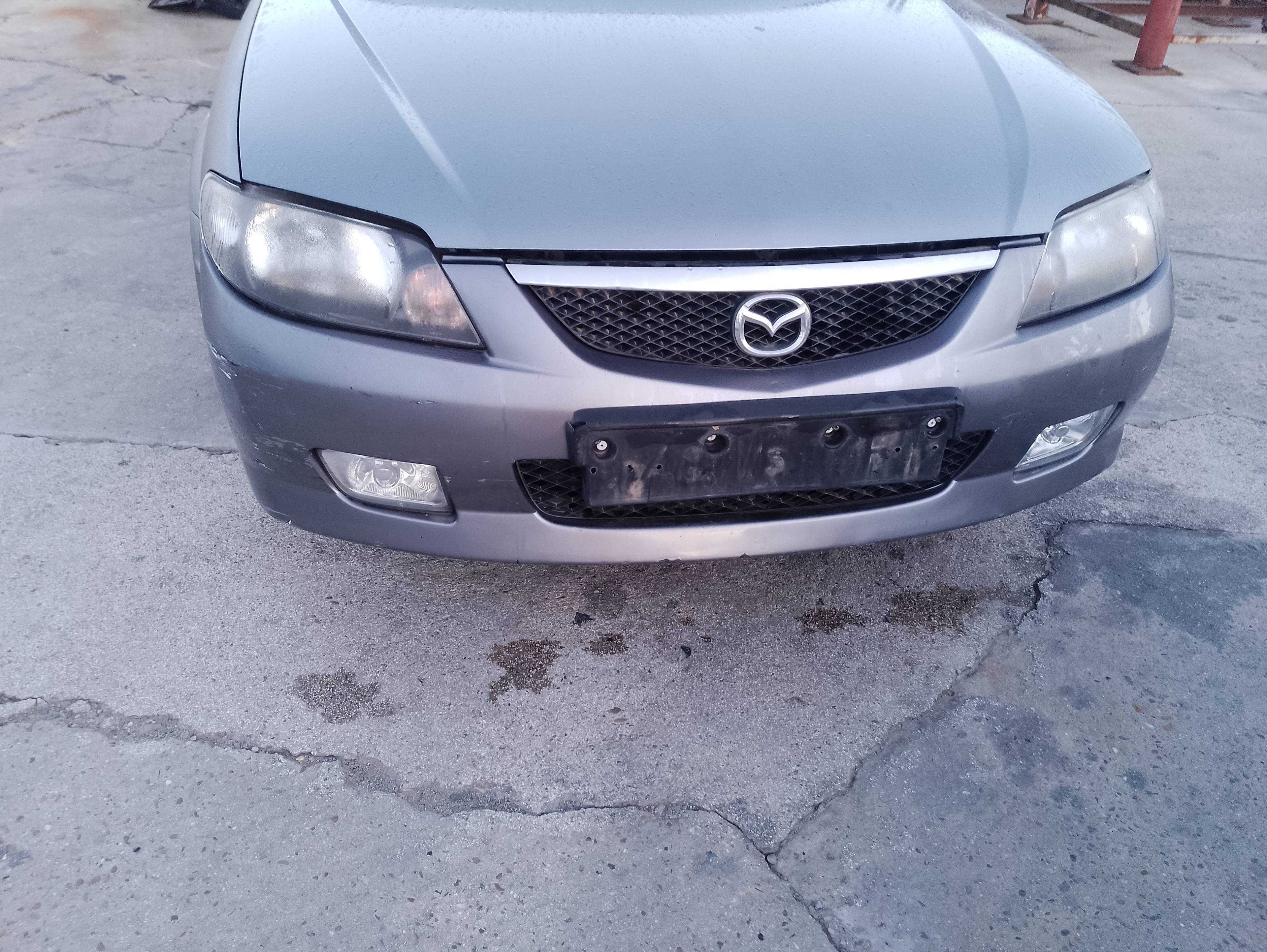 Recambio de paragolpes delantero para mazda 323 berl. f/s (bj) 2.0 d s exclusive referencia OEM IAM   