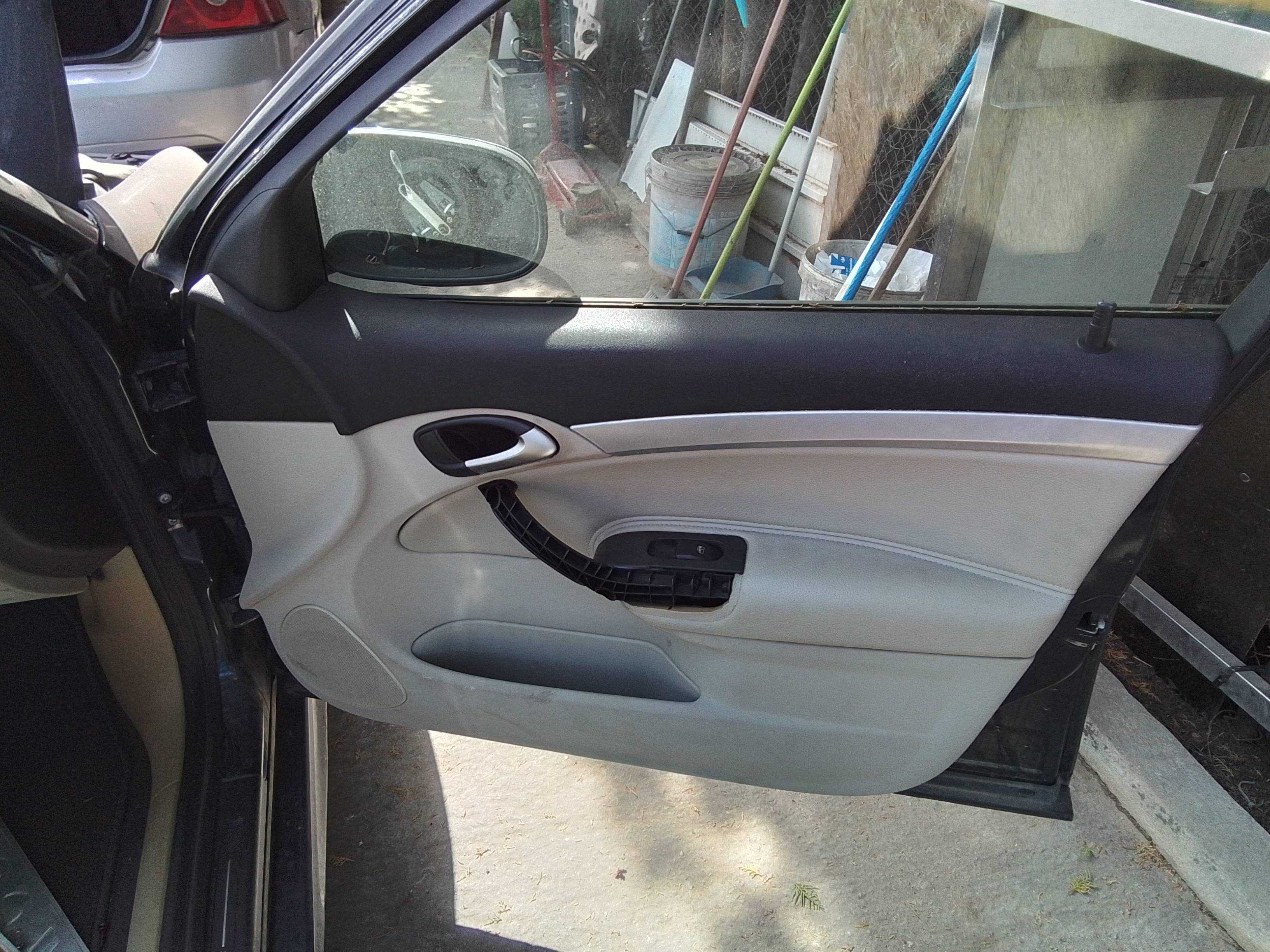 Recambio de guarnecido puerta delantera derecha para saab 9-3 berlina 1.9 tid cat referencia OEM IAM   