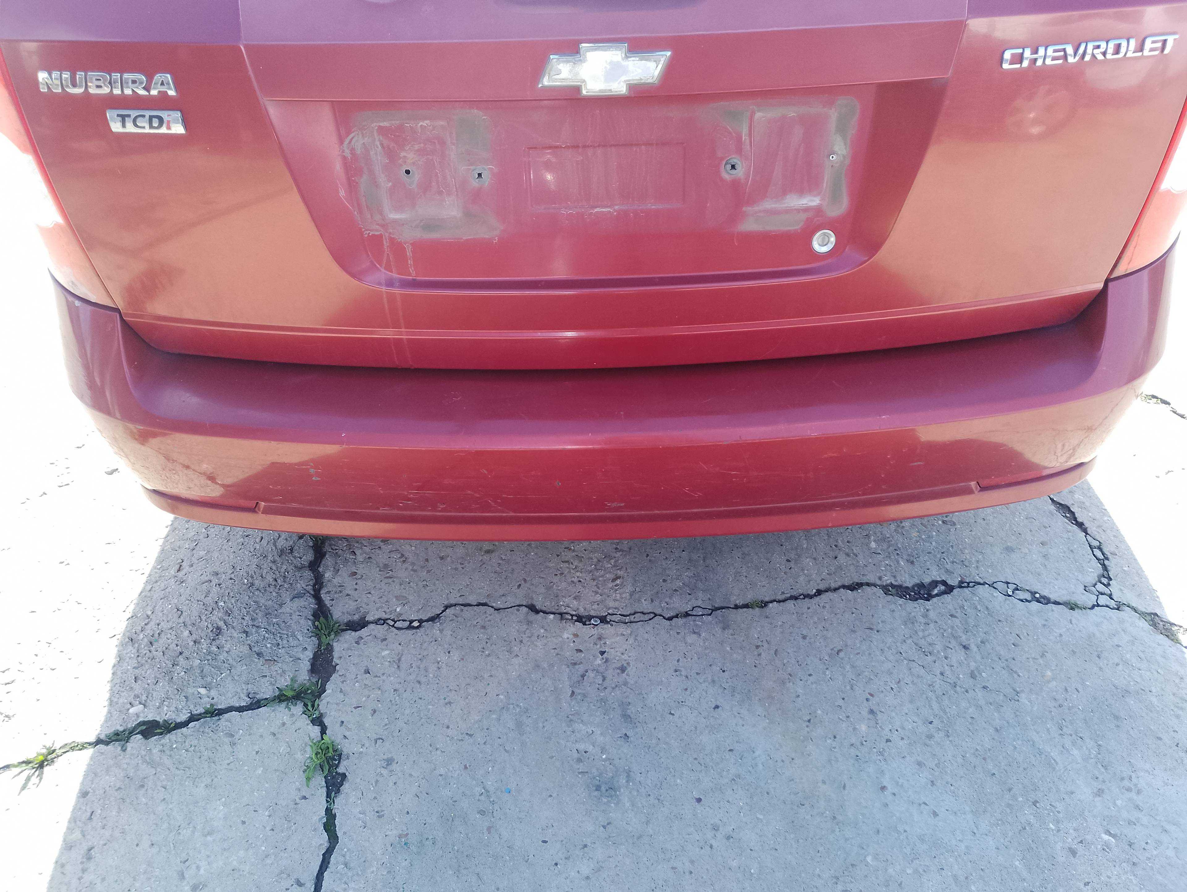 Recambio de paragolpes trasero para chevrolet nubira berlina 2.0 tcdi referencia OEM IAM   
