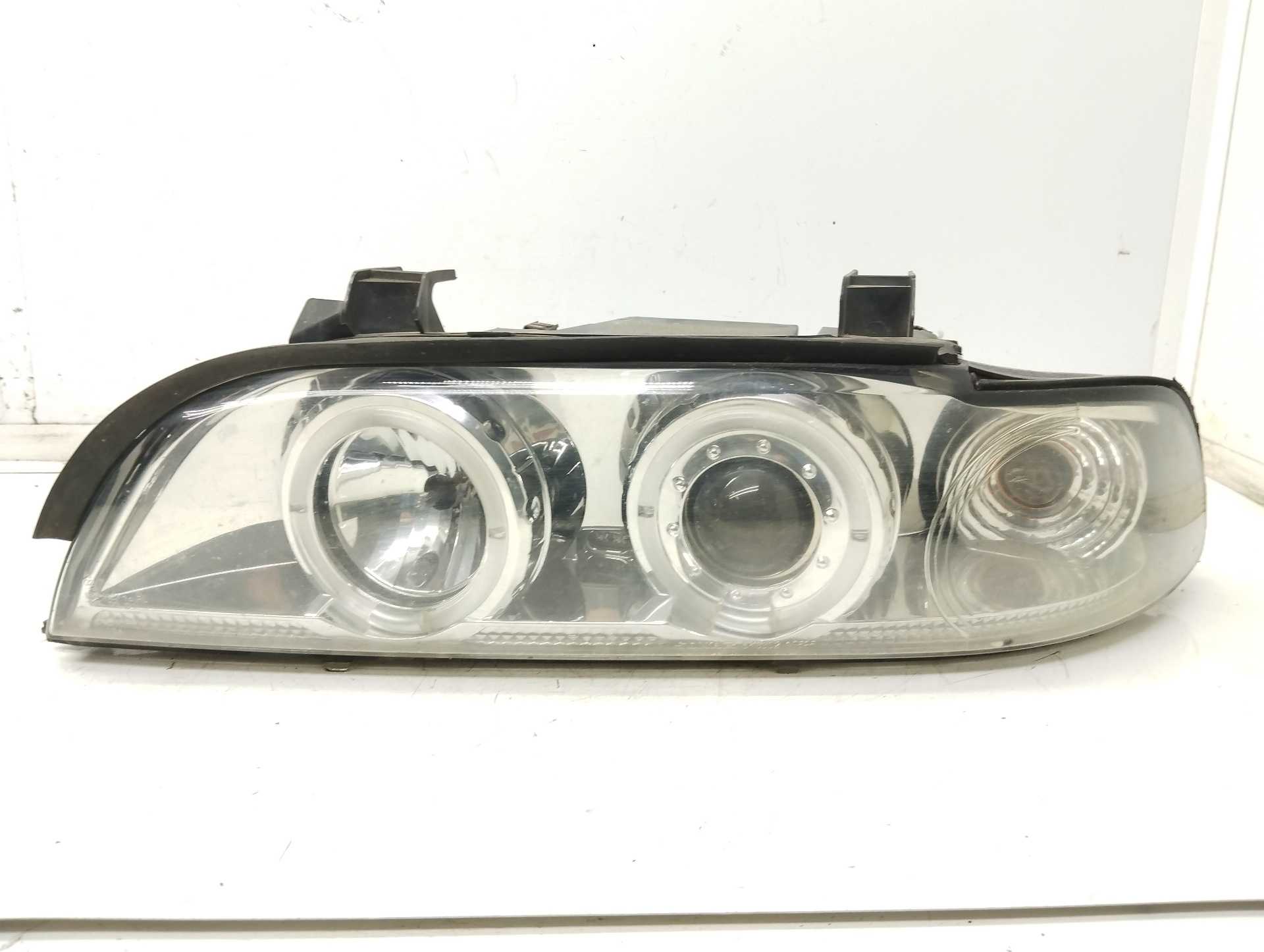 Recambio de faro izquierdo para bmw serie 5 berlina (e39) 523i referencia OEM IAM 15214000  
