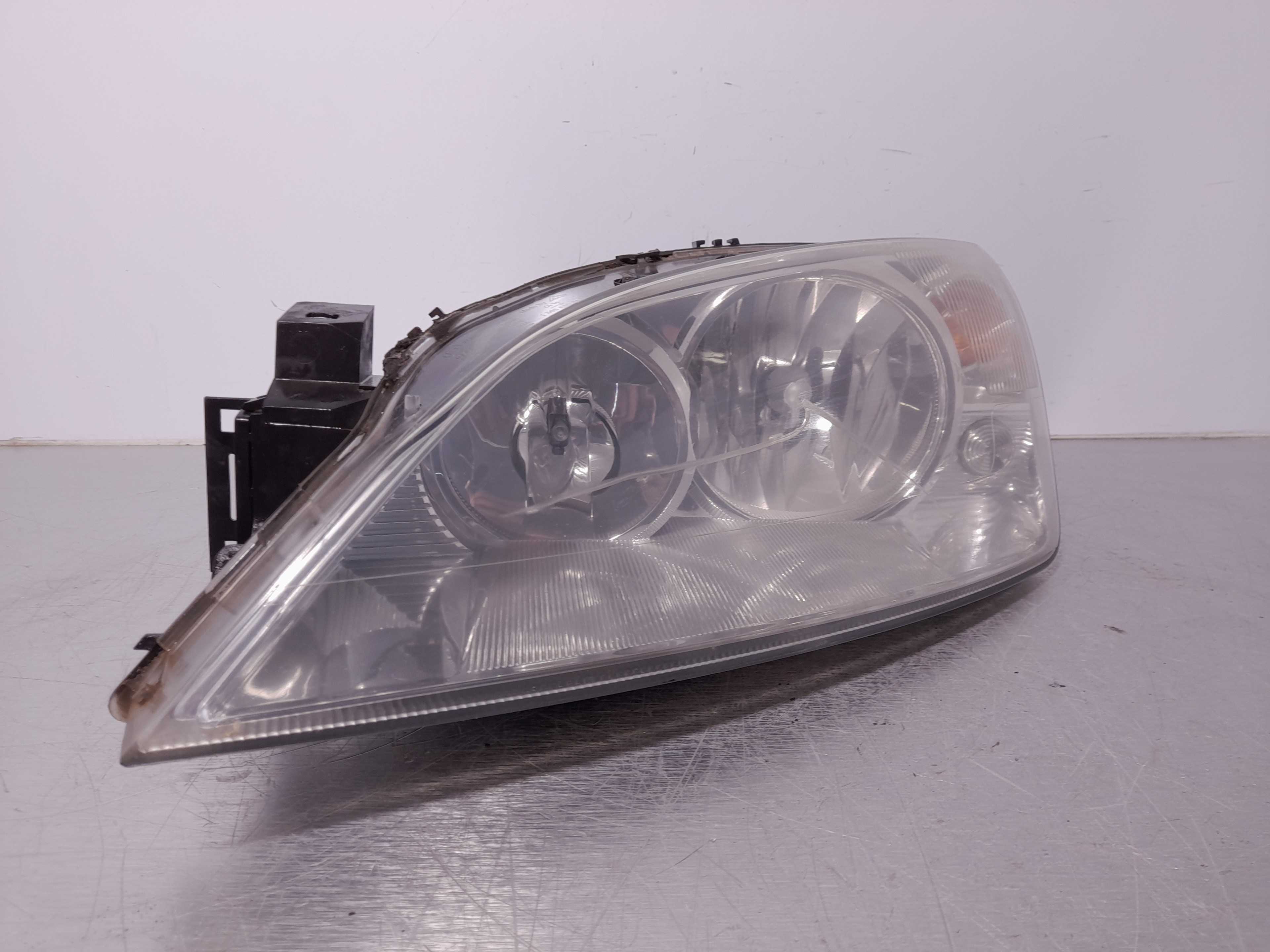 Recambio de faro izquierdo para ford mondeo berlina (ge) ambiente referencia OEM IAM 0301174201  