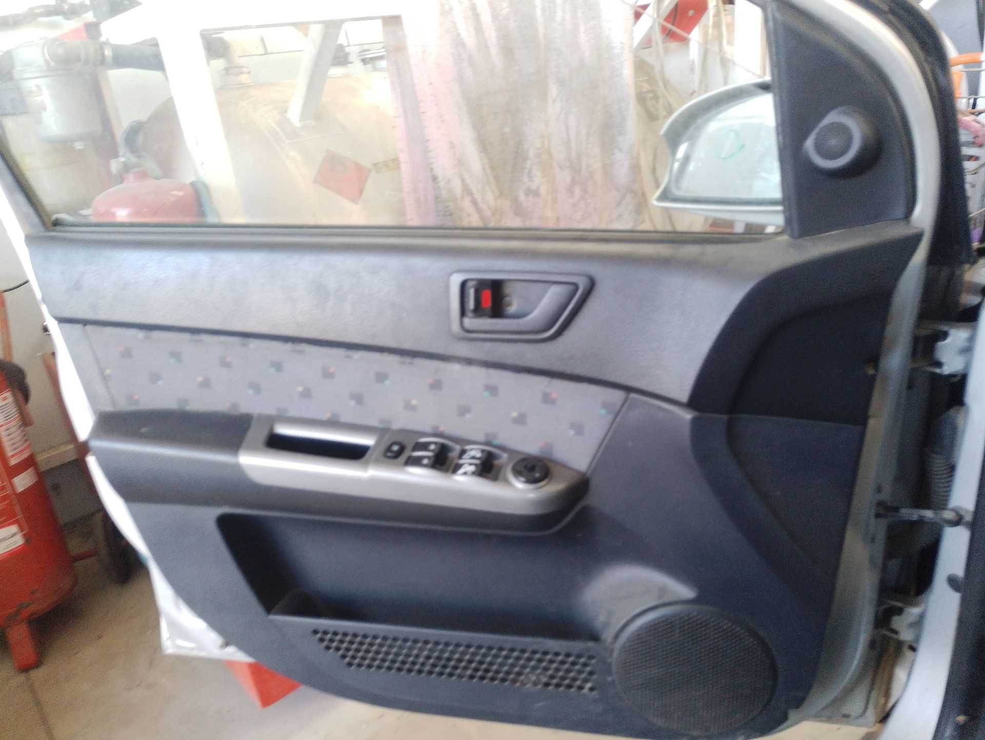 Recambio de guarnecido puerta delantera izquierda para hyundai getz (tb) 1.3 referencia OEM IAM   