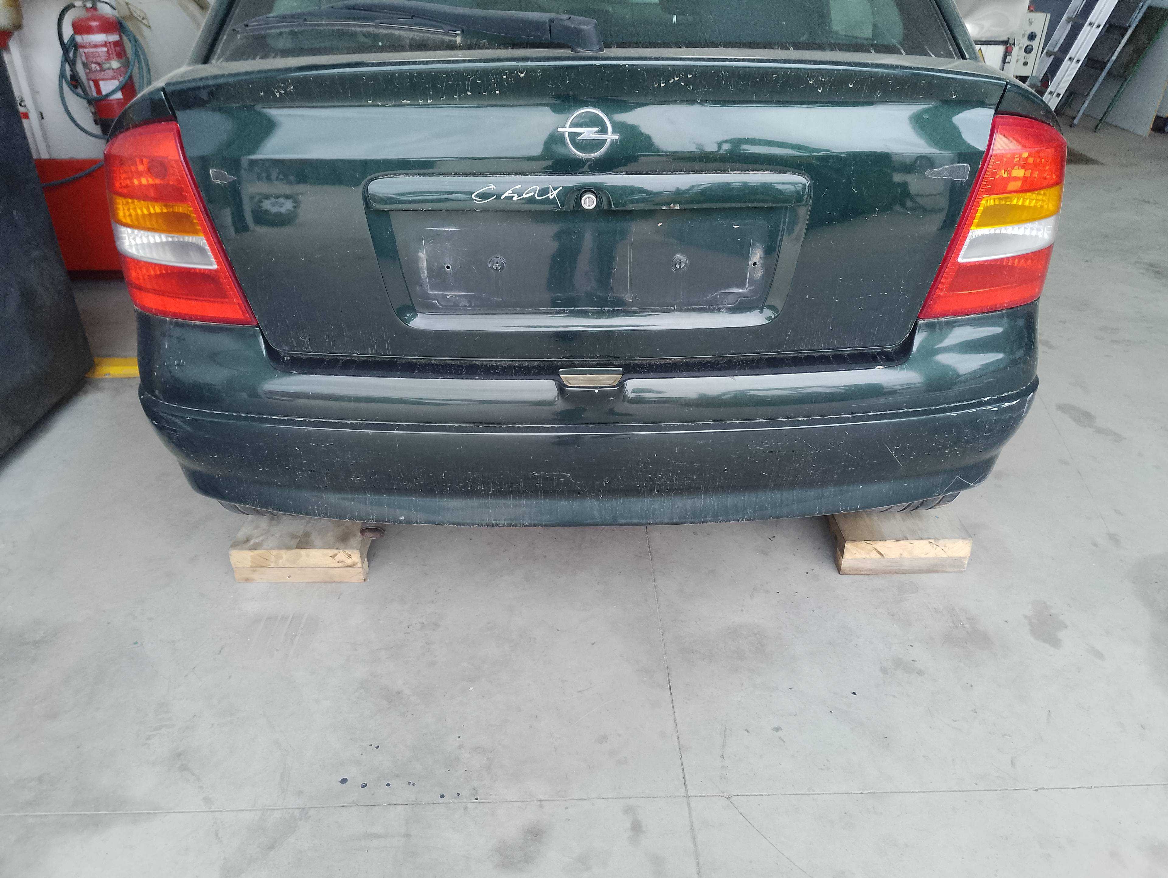 Recambio de paragolpes trasero para opel astra g berlina club referencia OEM IAM   