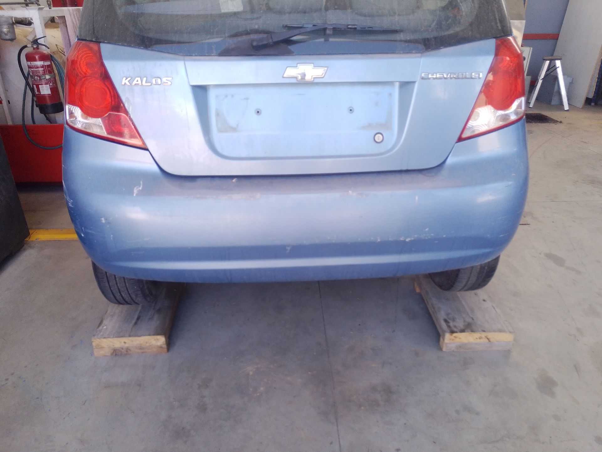 Recambio de paragolpes trasero para chevrolet aveo / kalos hatchback (t200) 1.2 referencia OEM IAM 96543014 / 96543017  
