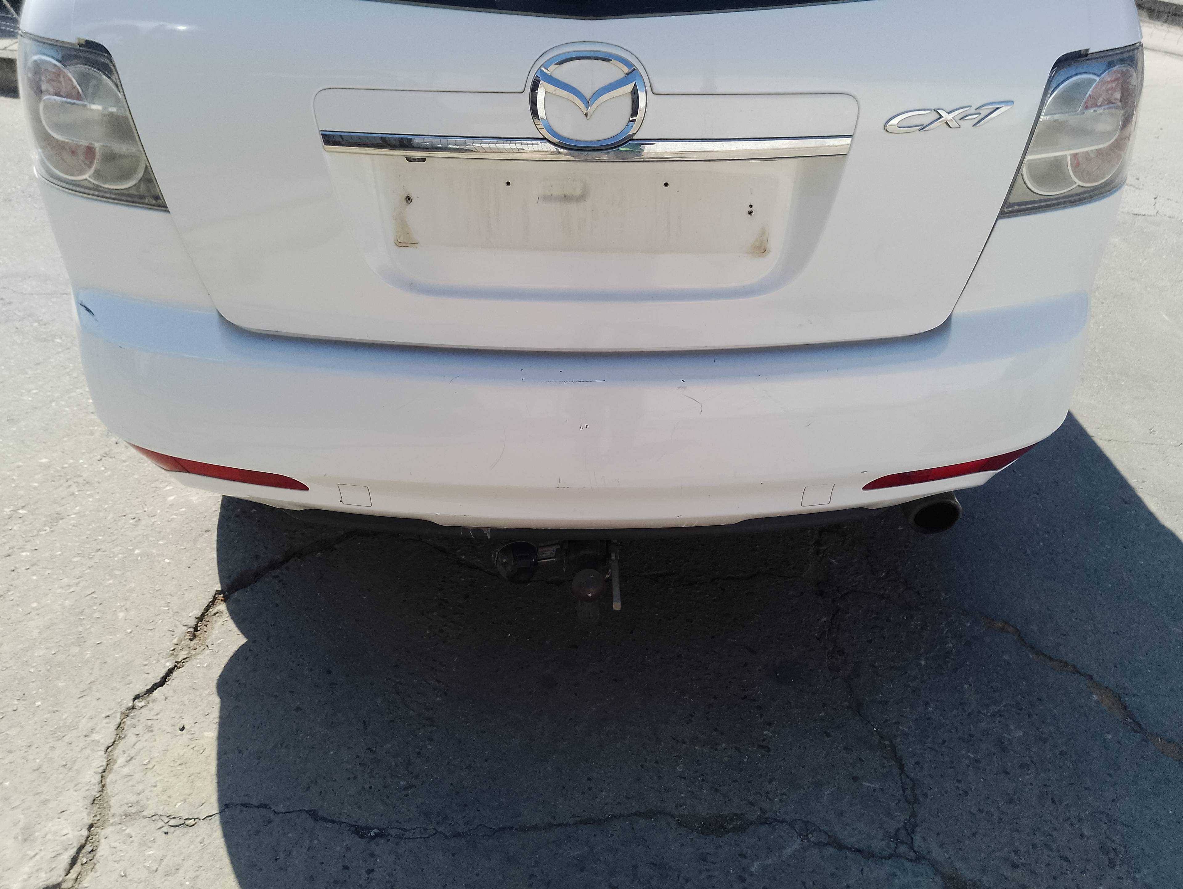 Recambio de paragolpes trasero para mazda cx-7 (er) active referencia OEM IAM   