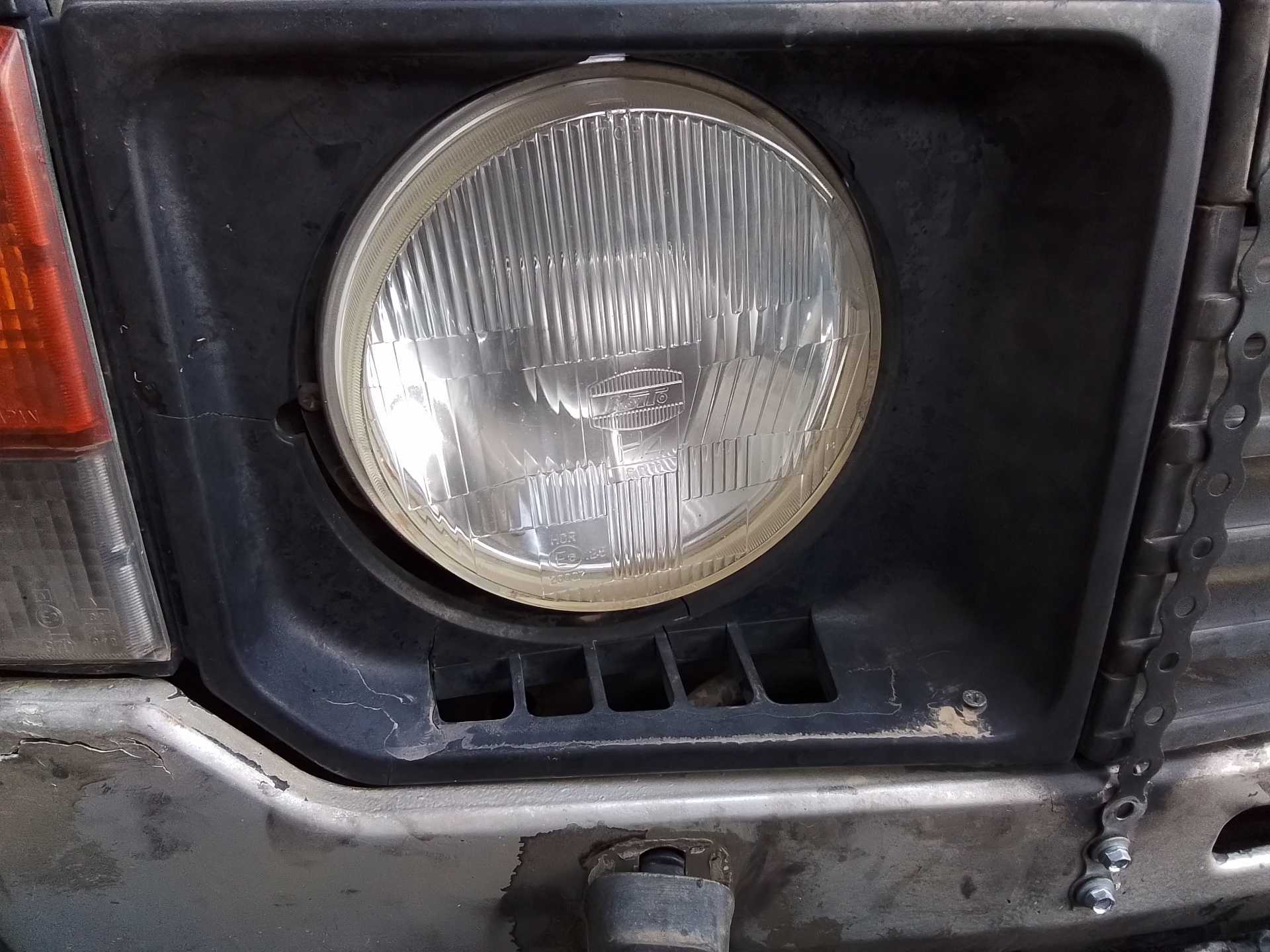 Recambio de faro derecho para mitsubishi pajero 2.3 diesel referencia OEM IAM   