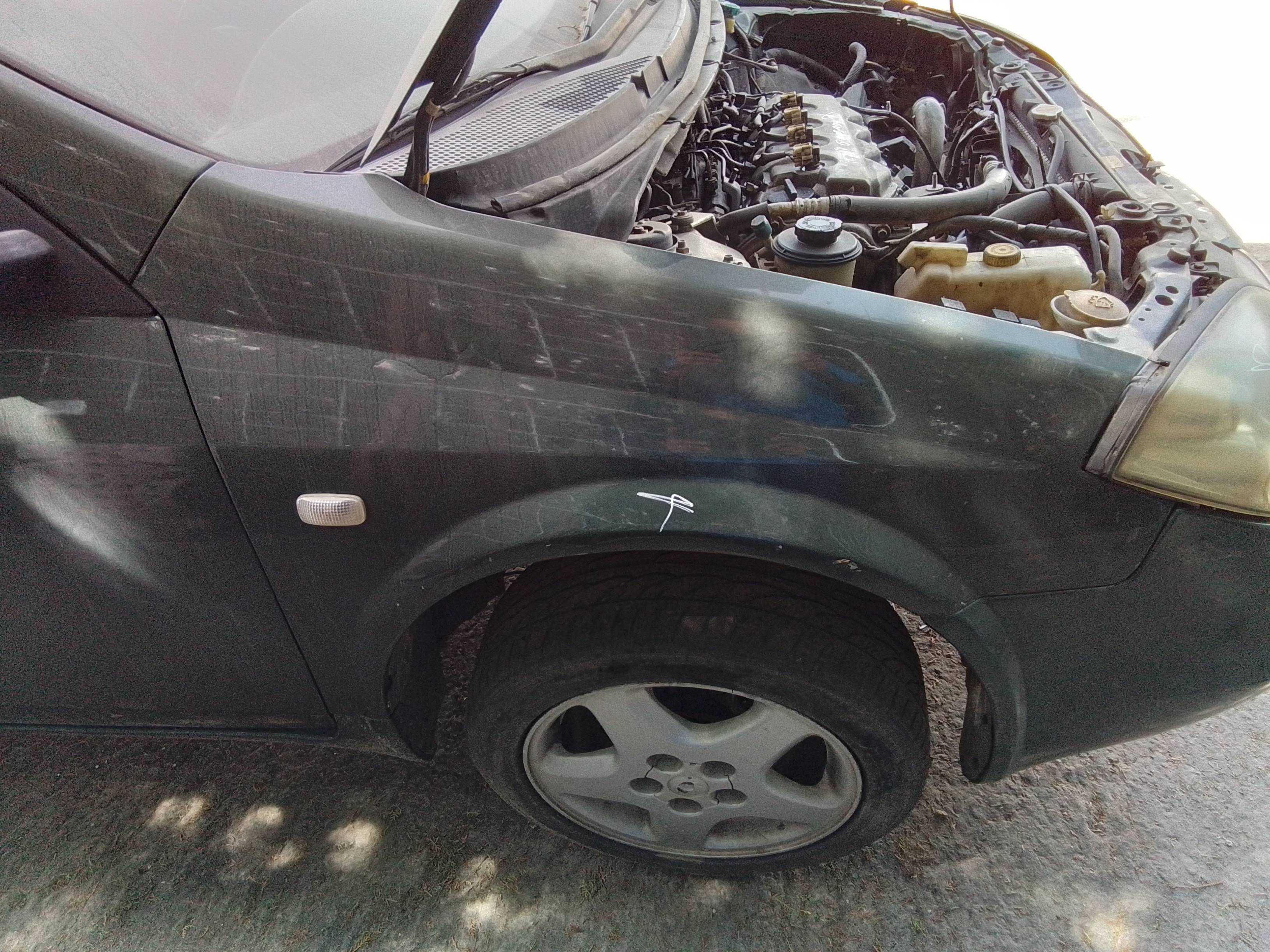Recambio de aleta delantera derecha para nissan primera berlina (p12) acenta referencia OEM IAM   