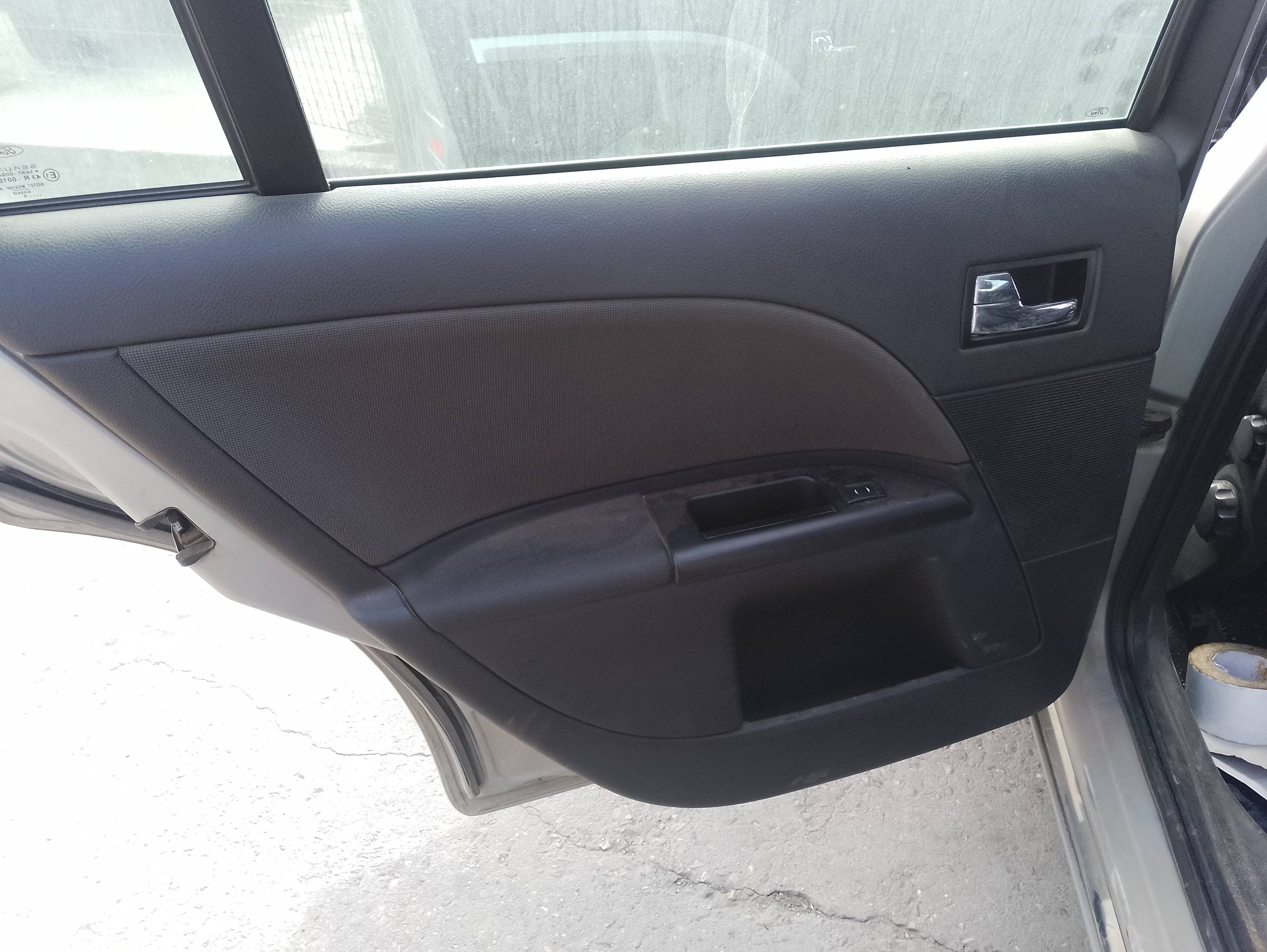 Recambio de guarnecido puerta trasera izquierda para ford mondeo berlina (ge) ambiente referencia OEM IAM   
