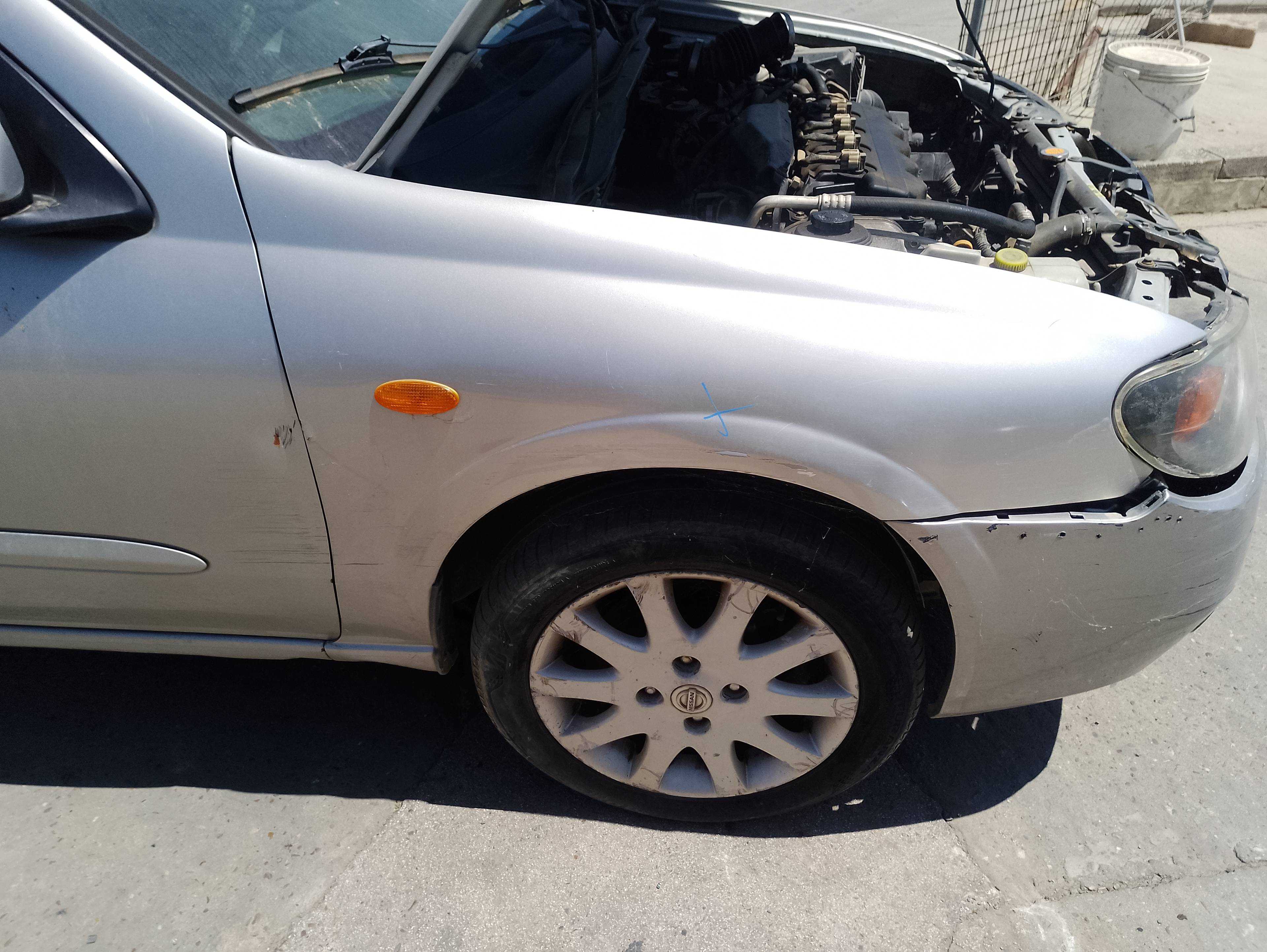 Recambio de aleta delantera derecha para nissan almera (n16/e) acenta referencia OEM IAM   