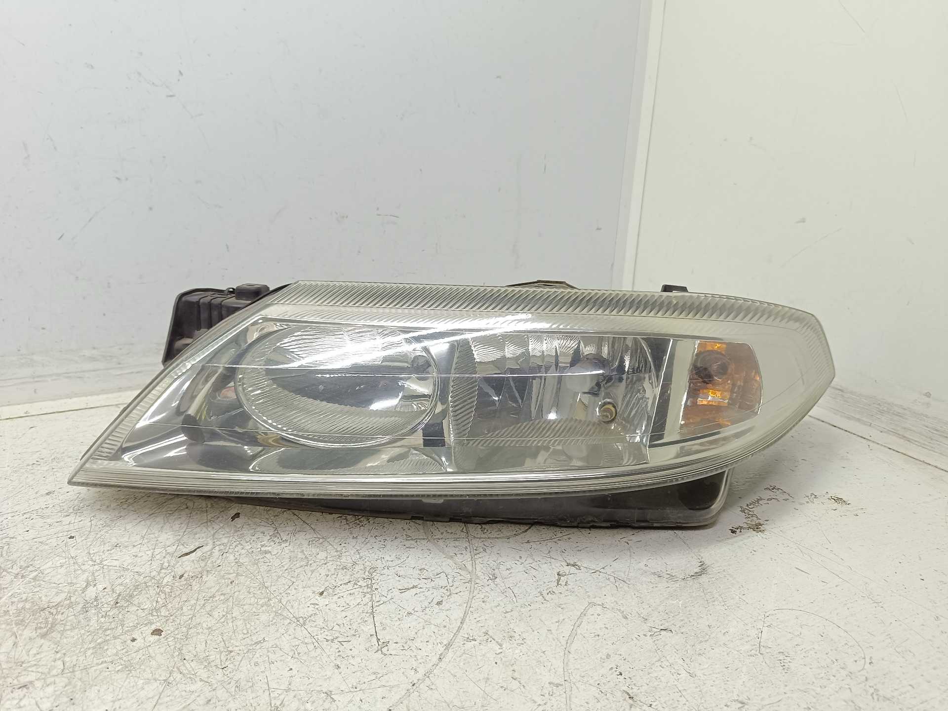 Recambio de faro izquierdo para renault laguna ii (bg0) confort authentique referencia OEM IAM 8200002845  