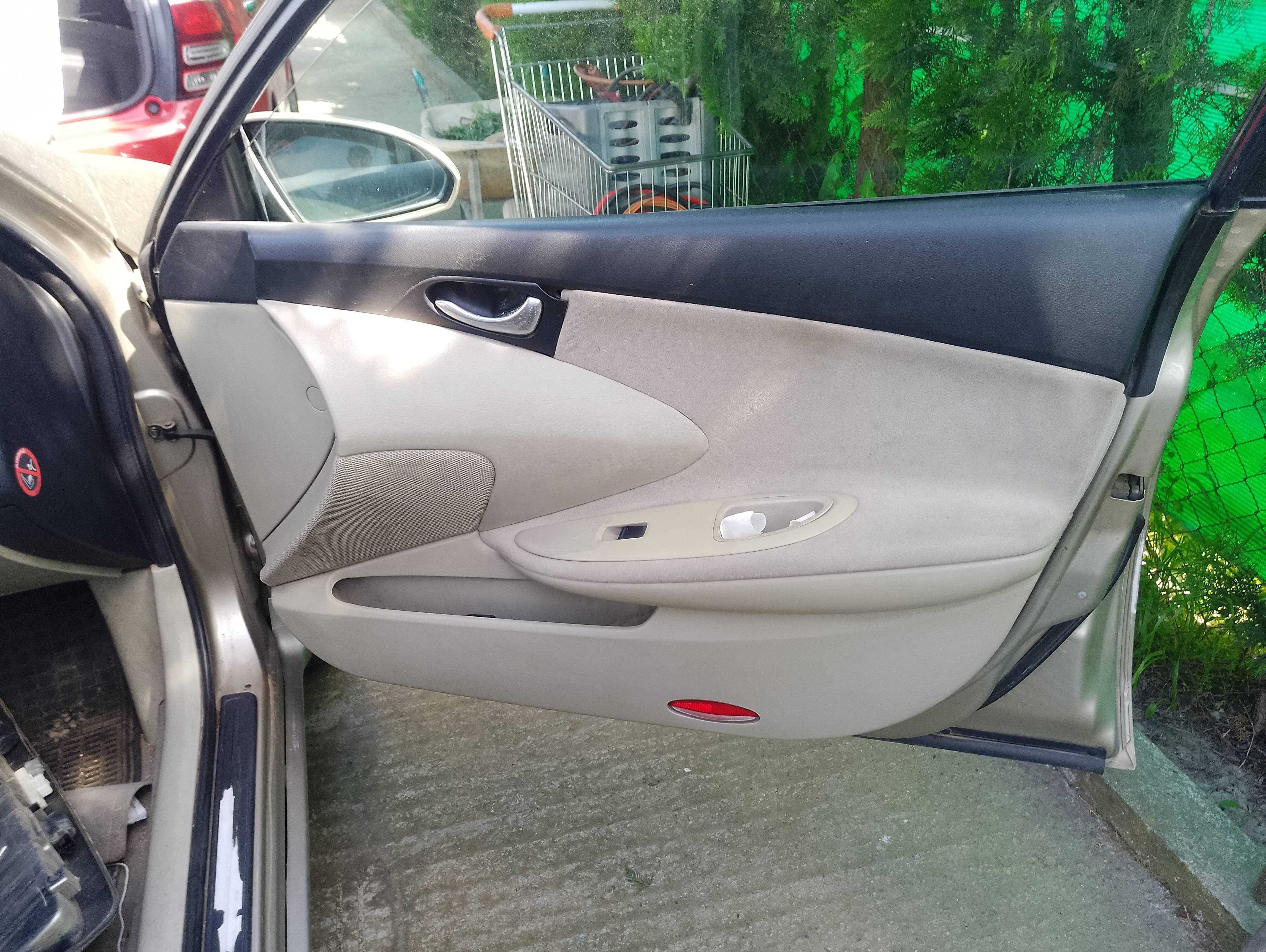 Recambio de guarnecido puerta delantera derecha para nissan primera berlina (p12) acenta referencia OEM IAM   