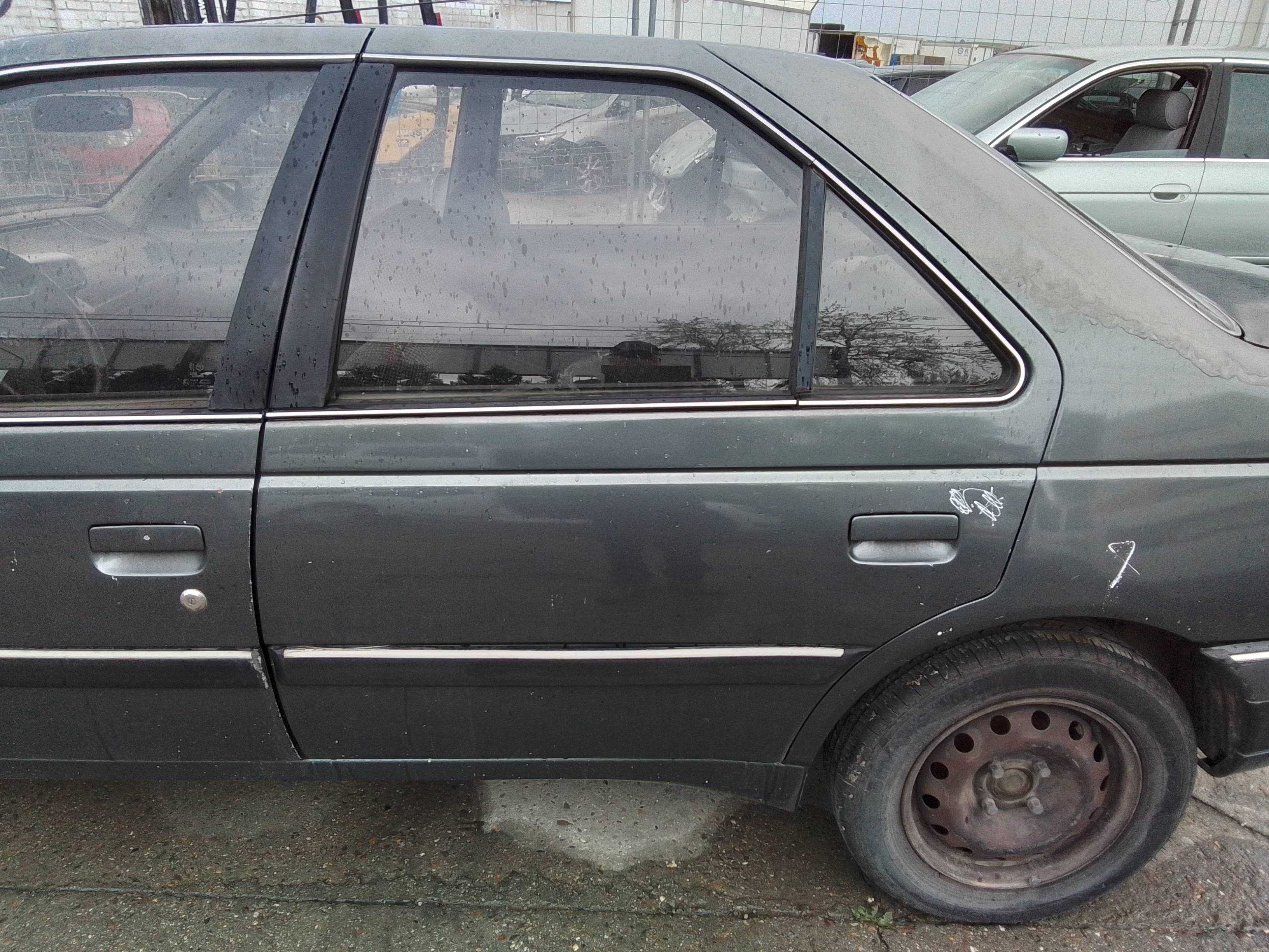 Recambio de puerta trasera izquierda para peugeot 405 berlina srd-turbo exclusive referencia OEM IAM   