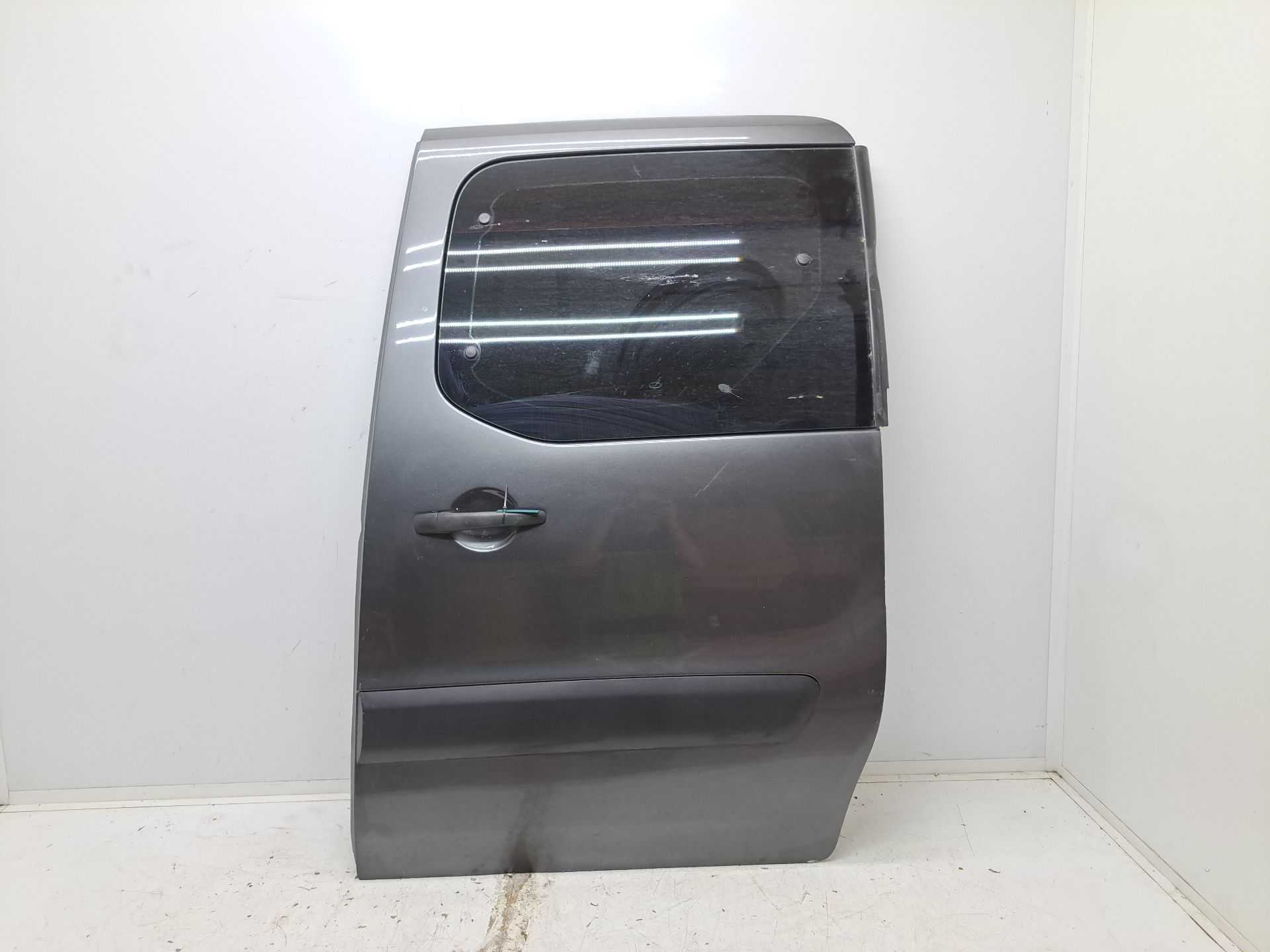 Recambio de puerta lateral corredera izquierda para citroën berlingo station wagon xtr referencia OEM IAM   
