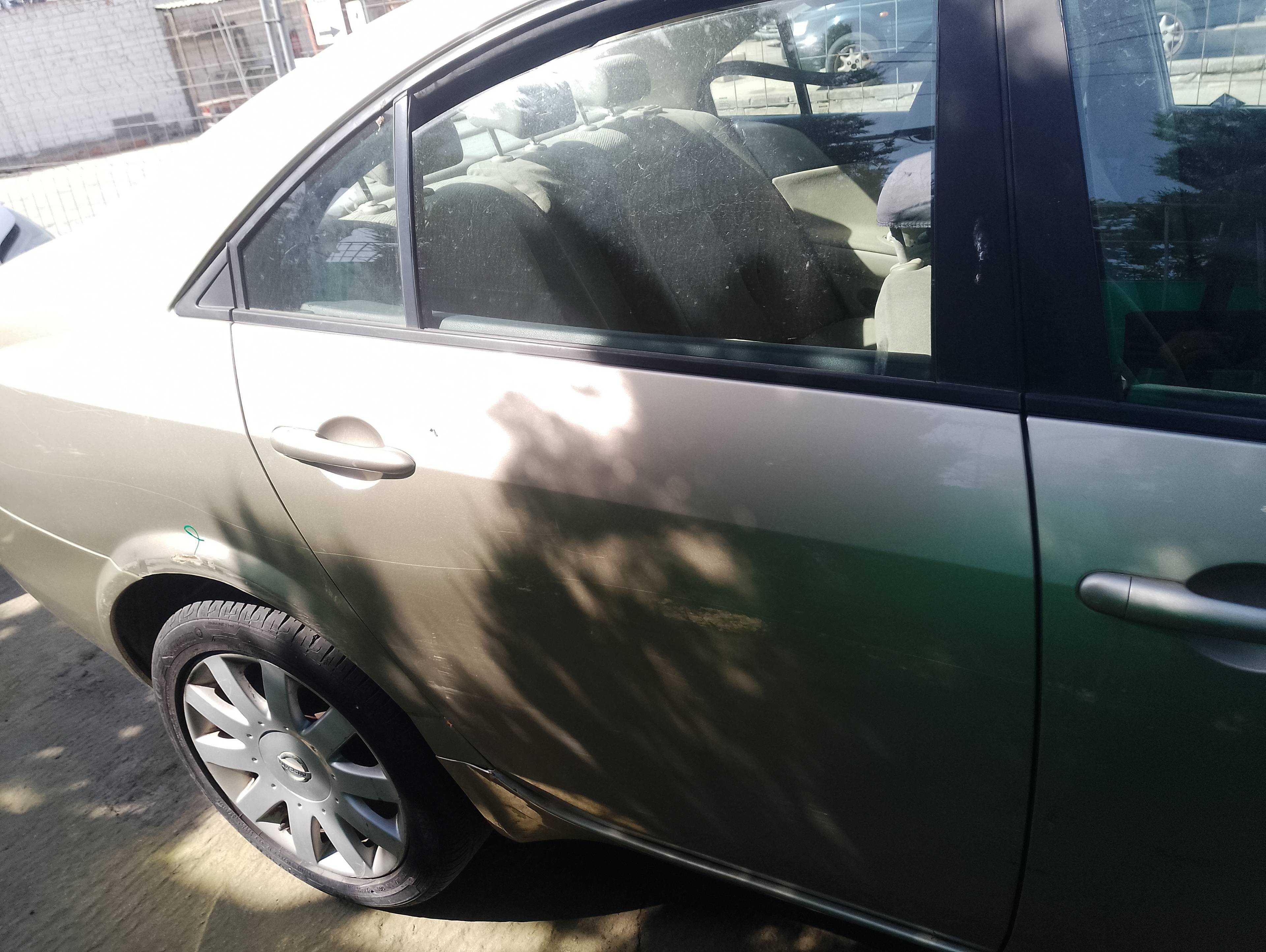Recambio de puerta trasera derecha para nissan primera berlina (p12) acenta referencia OEM IAM   