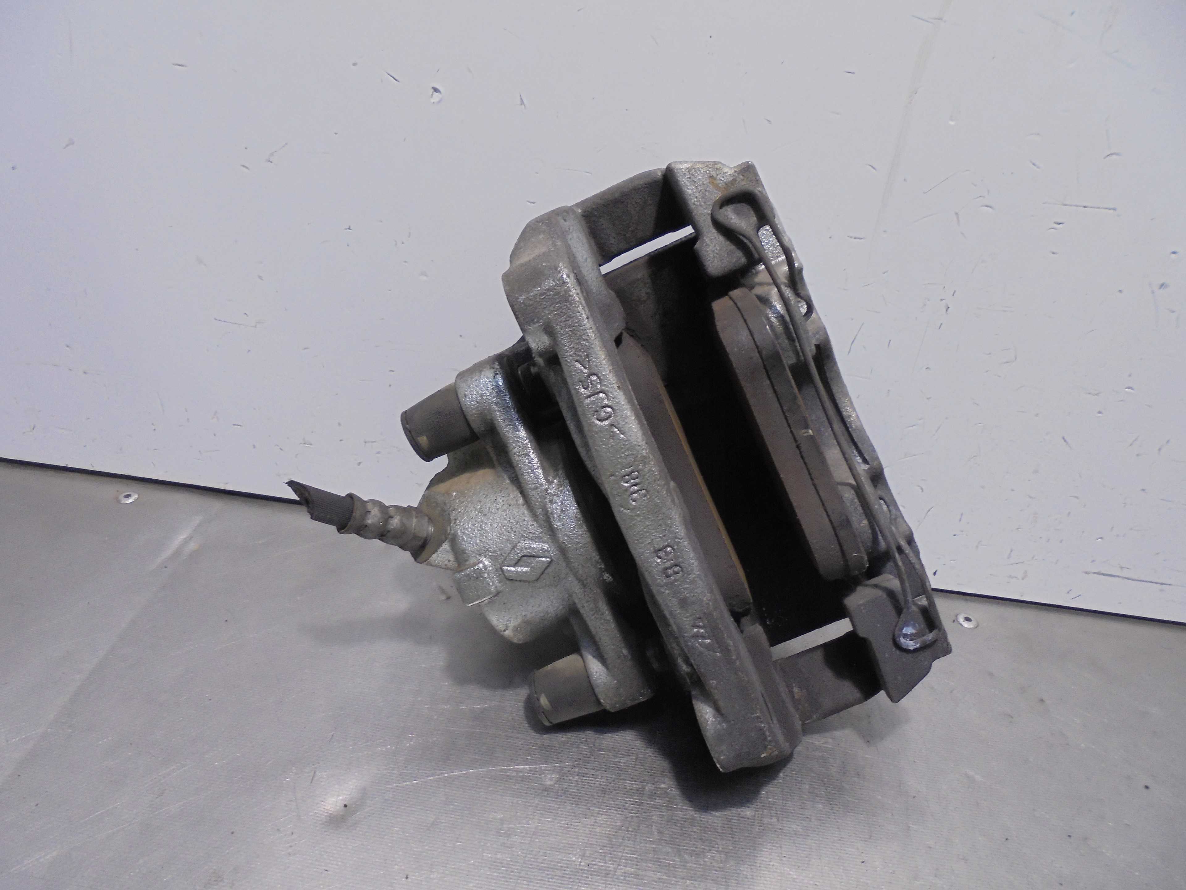 Recambio de pinza de freno delantera derecha para renault express referencia OEM IAM  ATE 