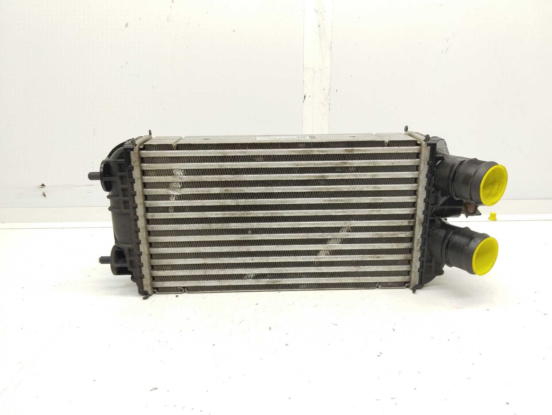 Recambio de intercooler para opel corsa f edition referencia OEM IAM 9824742280  