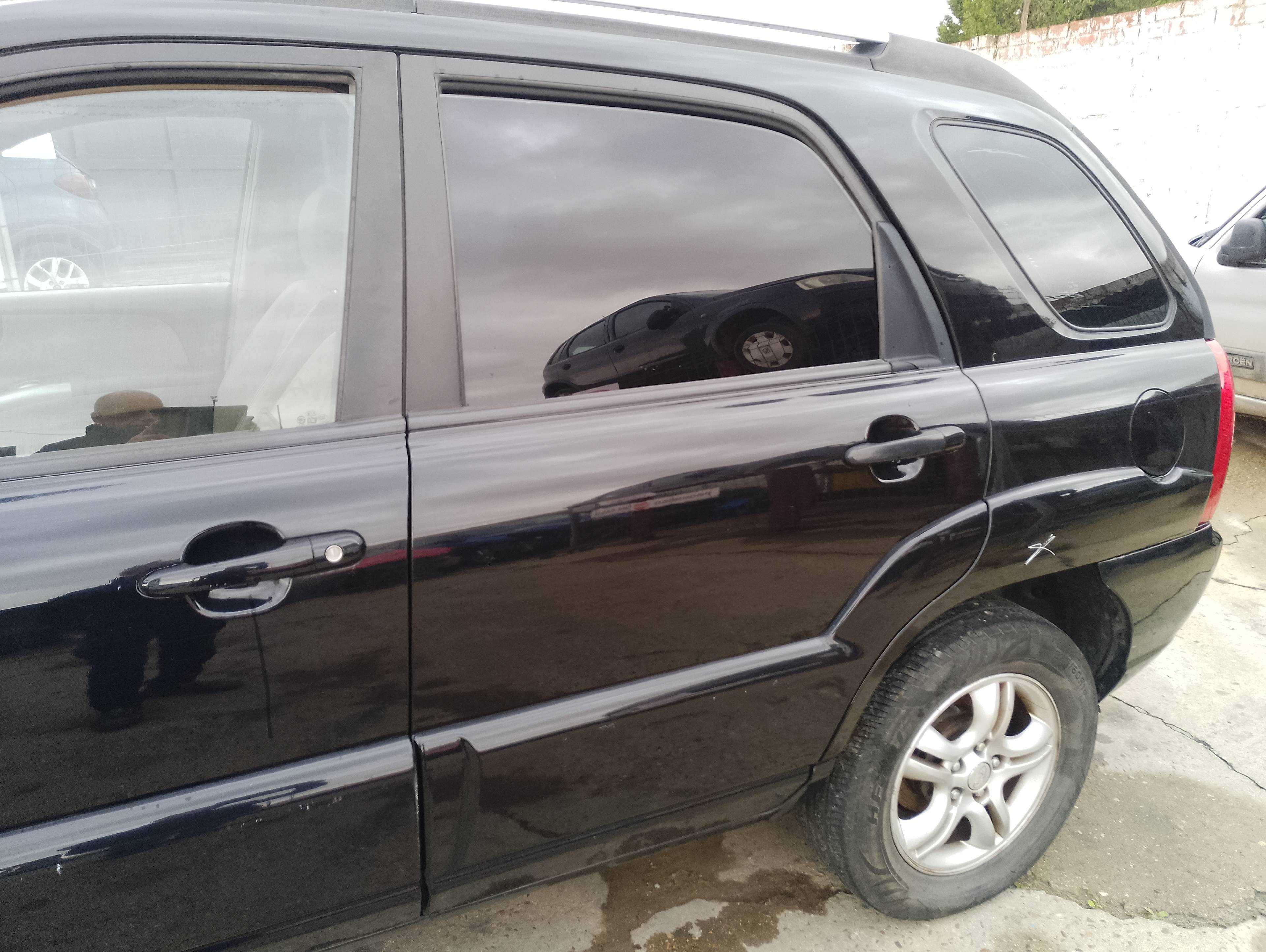 Recambio de puerta trasera izquierda para kia sportage drive 4x4 referencia OEM IAM   