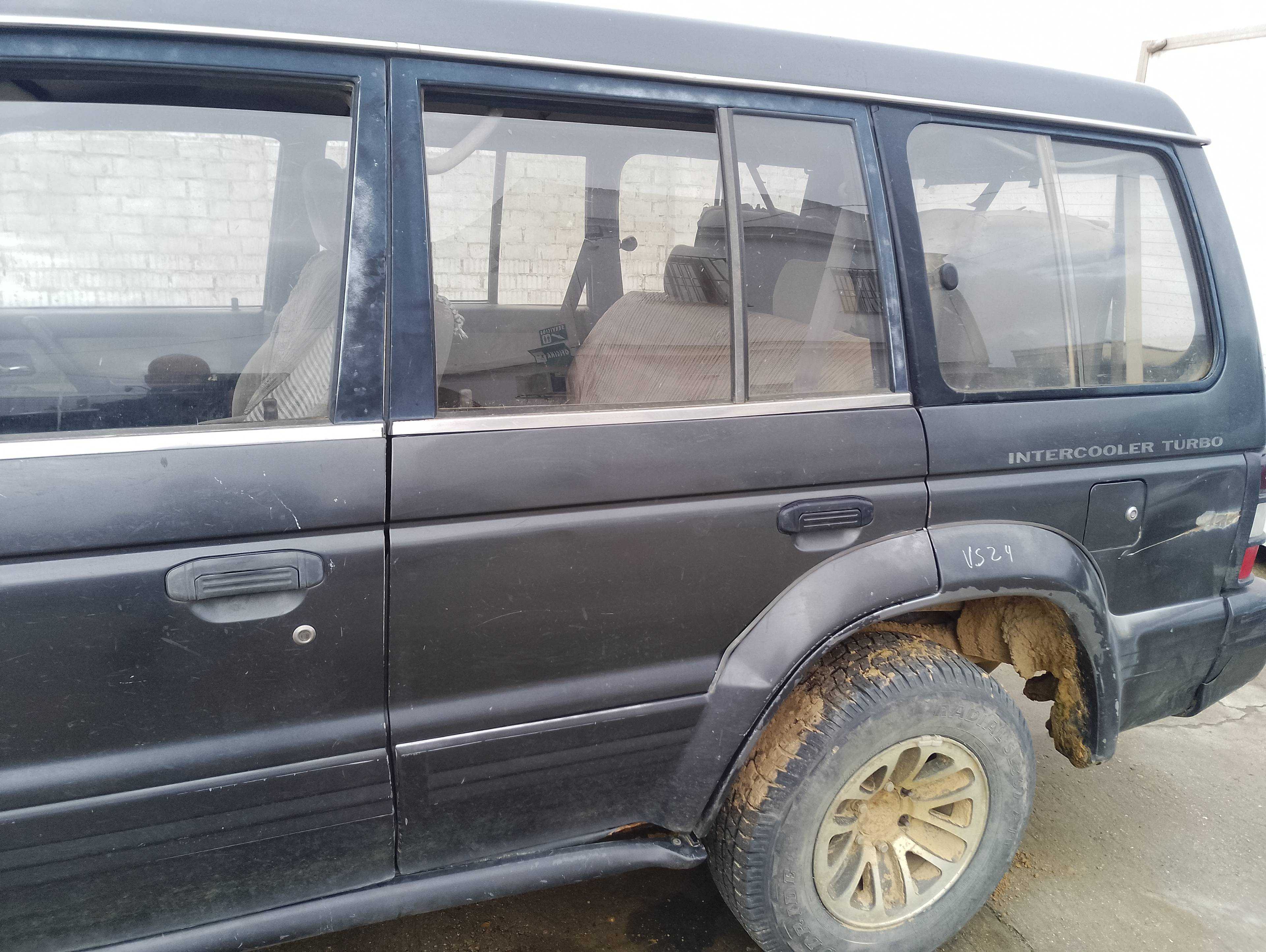 Recambio de puerta trasera izquierda para mitsubishi pajero 2.5 turbodiesel referencia OEM IAM   
