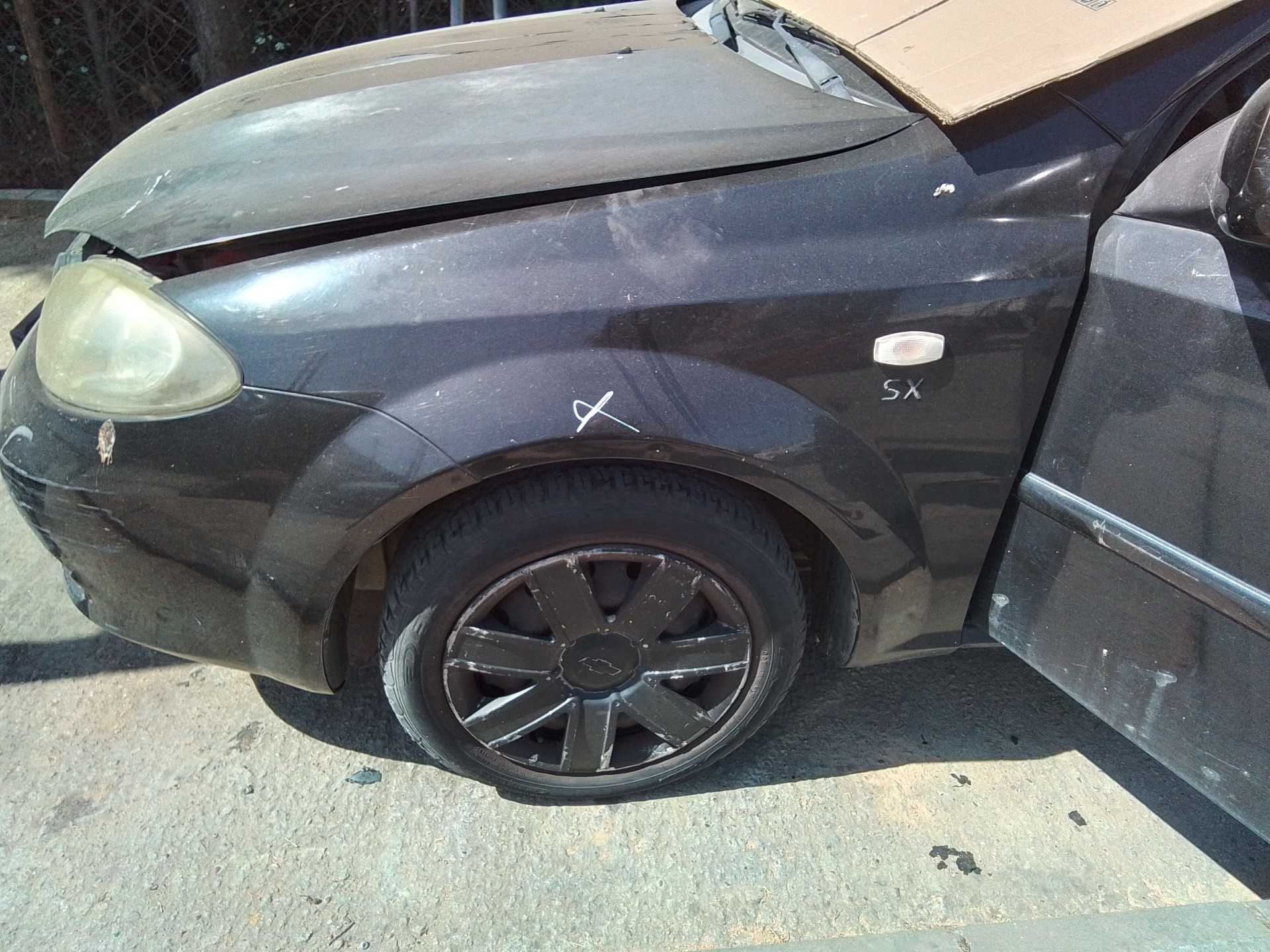 Recambio de aleta delantera izquierda para chevrolet lacetti 1.6 cat referencia OEM IAM   