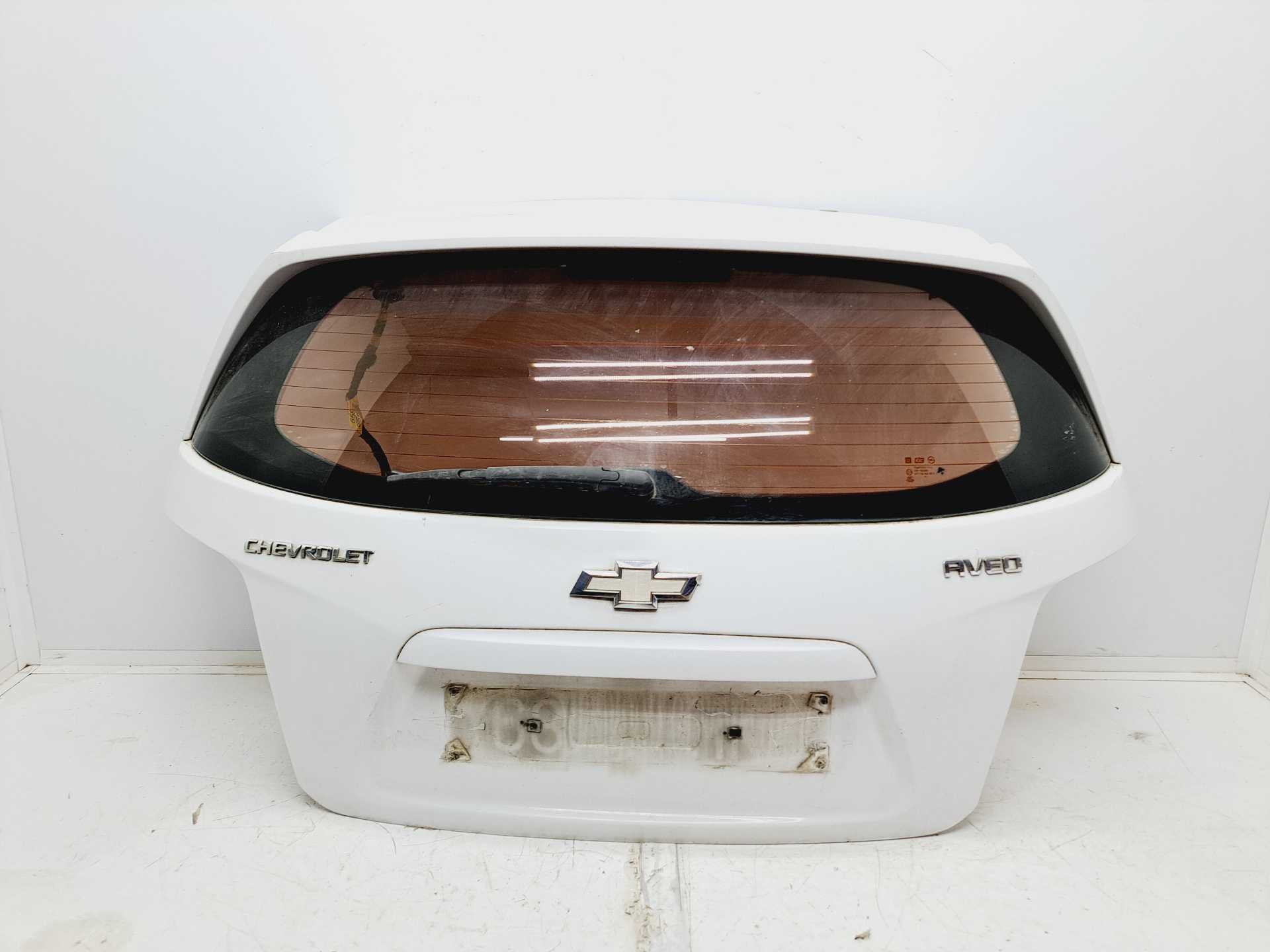 Recambio de porton trasero para chevrolet aveo sedán lt+ referencia OEM IAM  42624764 