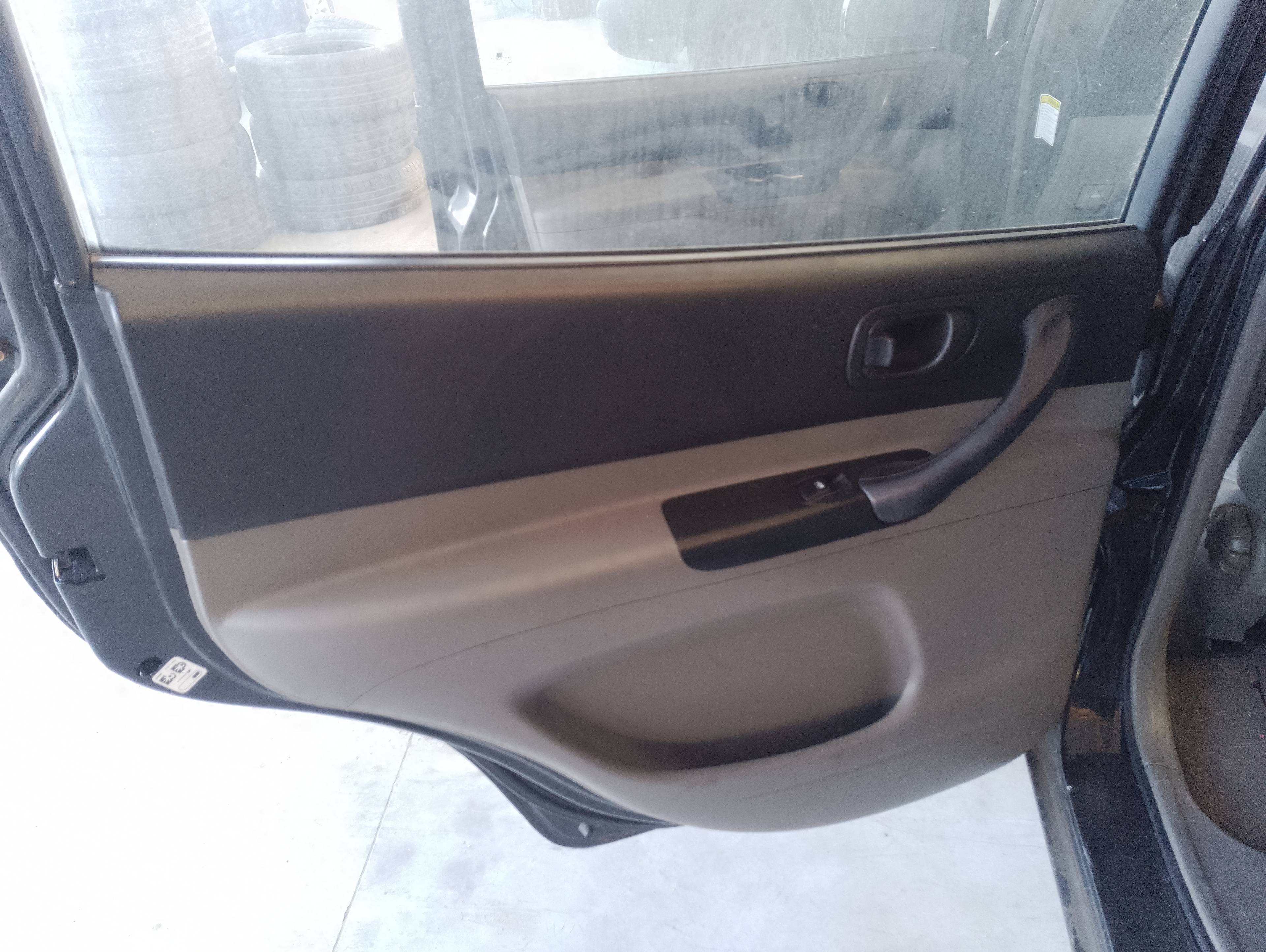 Recambio de guarnecido puerta trasera izquierda para chevrolet tacuma se referencia OEM IAM   