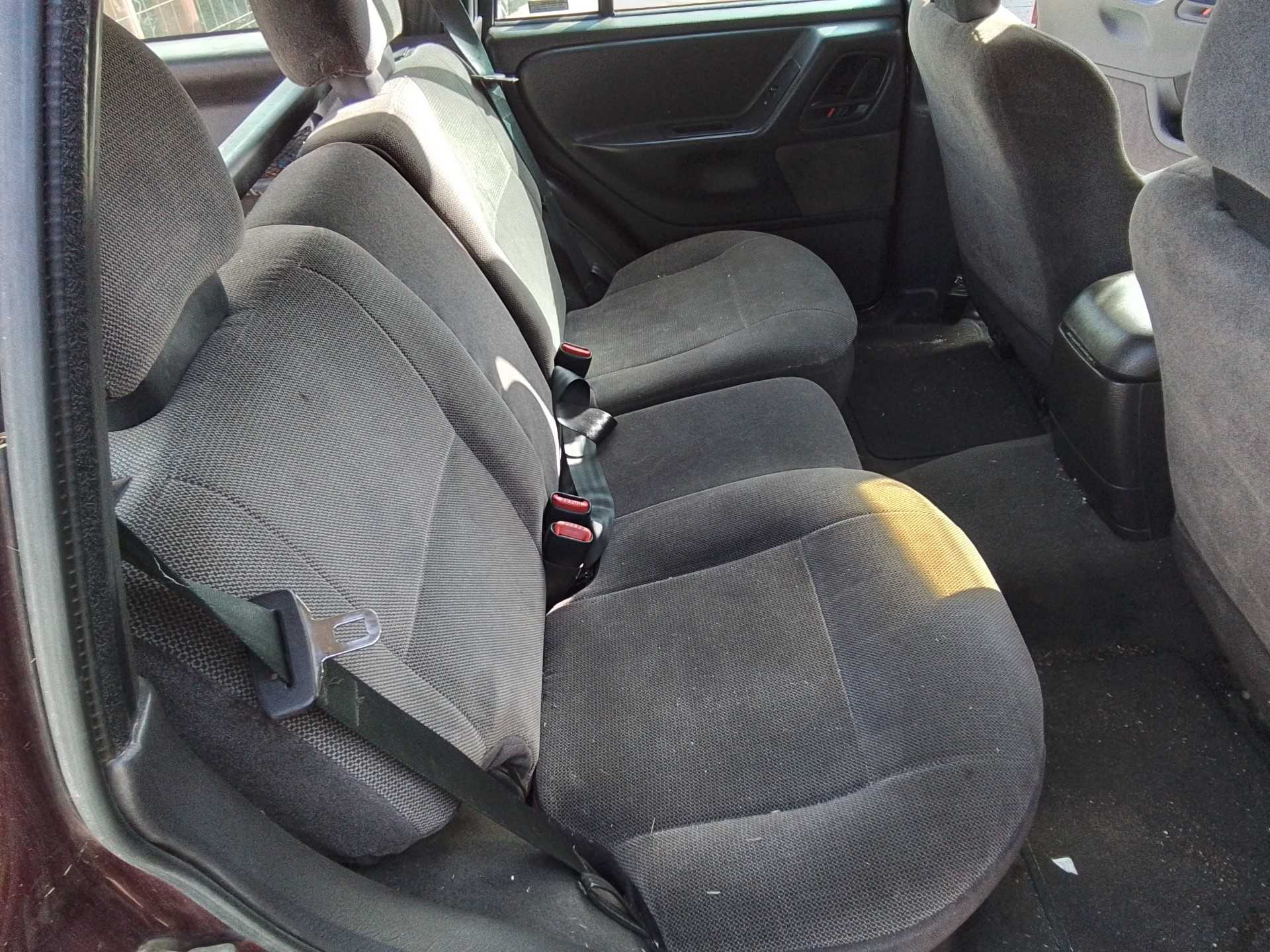 Recambio de asientos traseros para chrysler jeep gr.cherokee (wj/wg) 3.1 td laredo referencia OEM IAM   