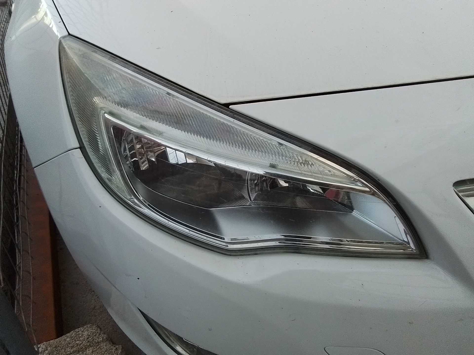 Recambio de faro derecho para opel astra j lim. 1.3 16v cdti referencia OEM IAM   
