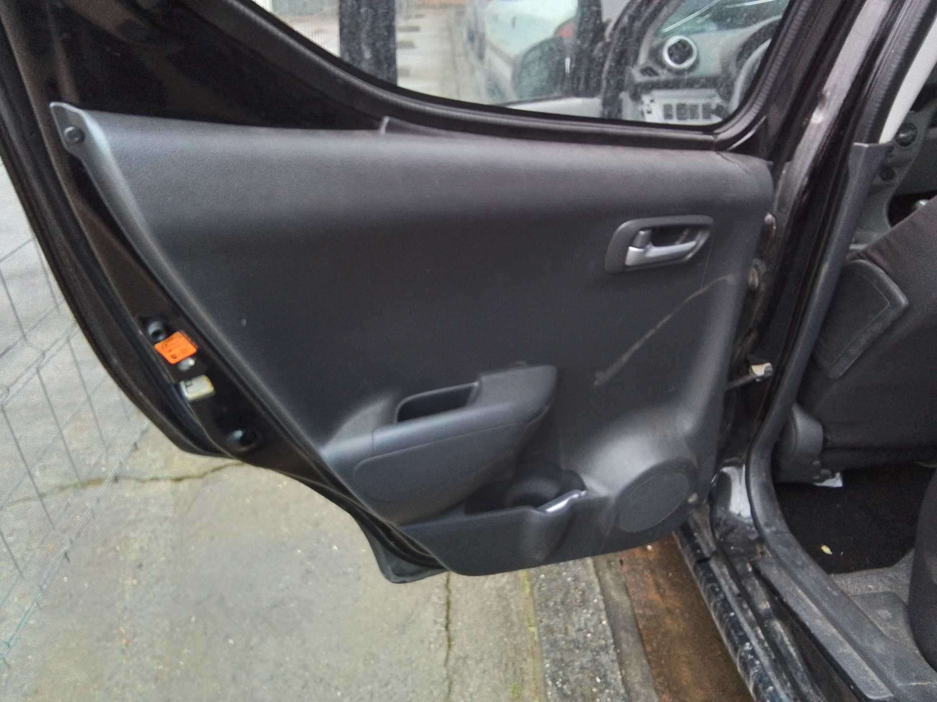 Recambio de guarnecido puerta trasera izquierda para nissan pixo (uao) acenta referencia OEM IAM   