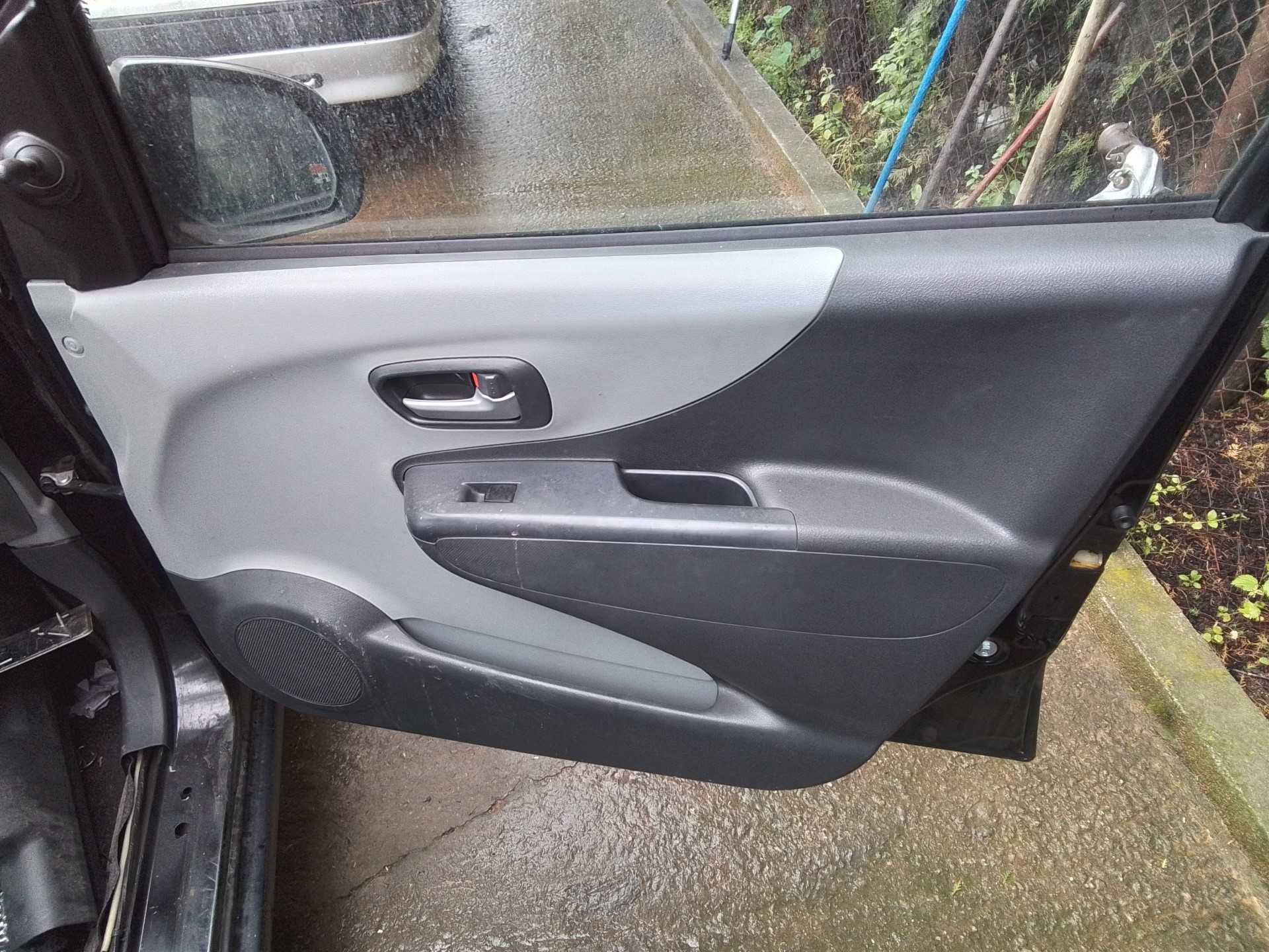Recambio de guarnecido puerta delantera derecha para nissan pixo (uao) acenta referencia OEM IAM   