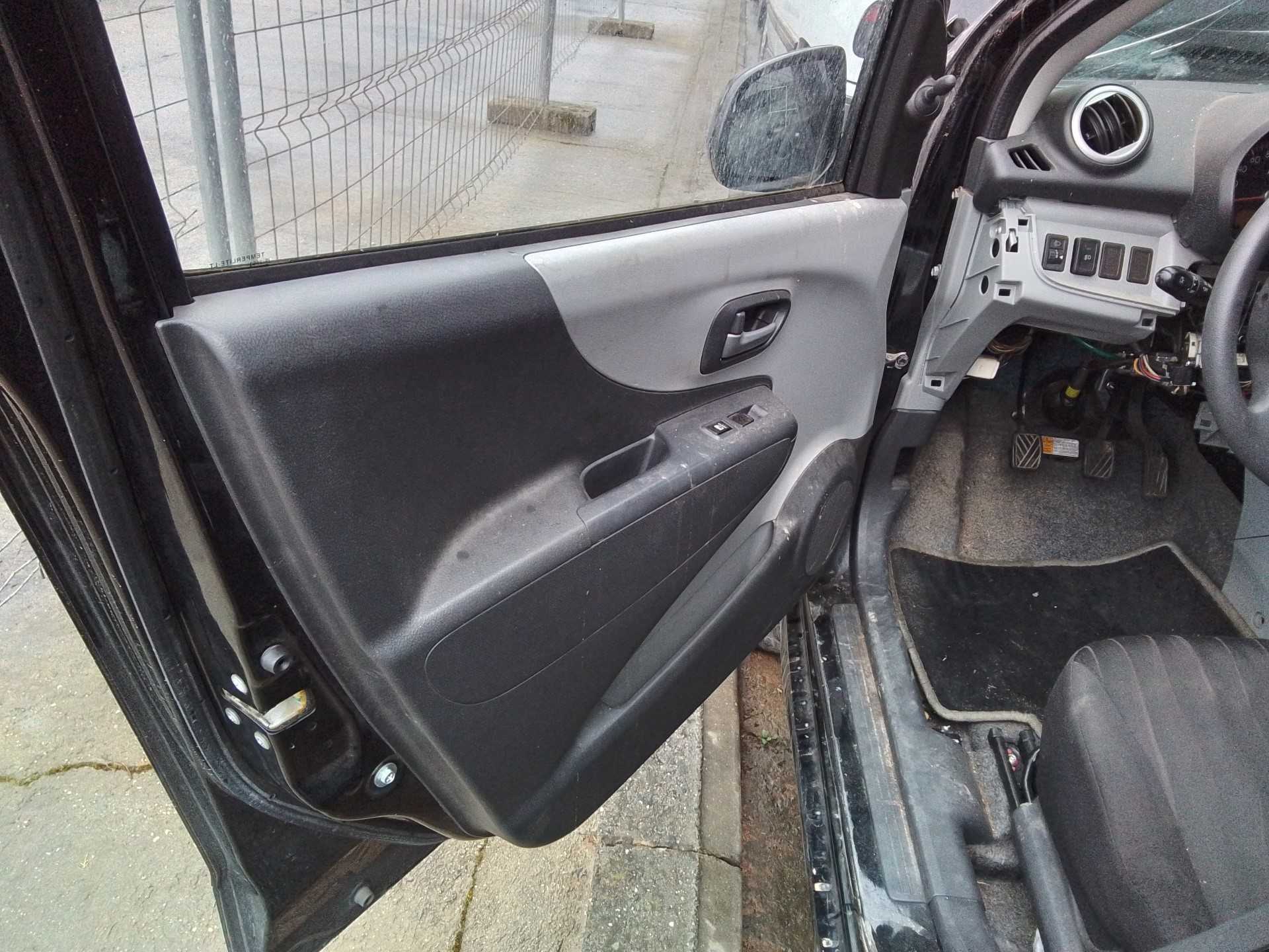 Recambio de guarnecido puerta delantera izquierda para nissan pixo (uao) acenta referencia OEM IAM   