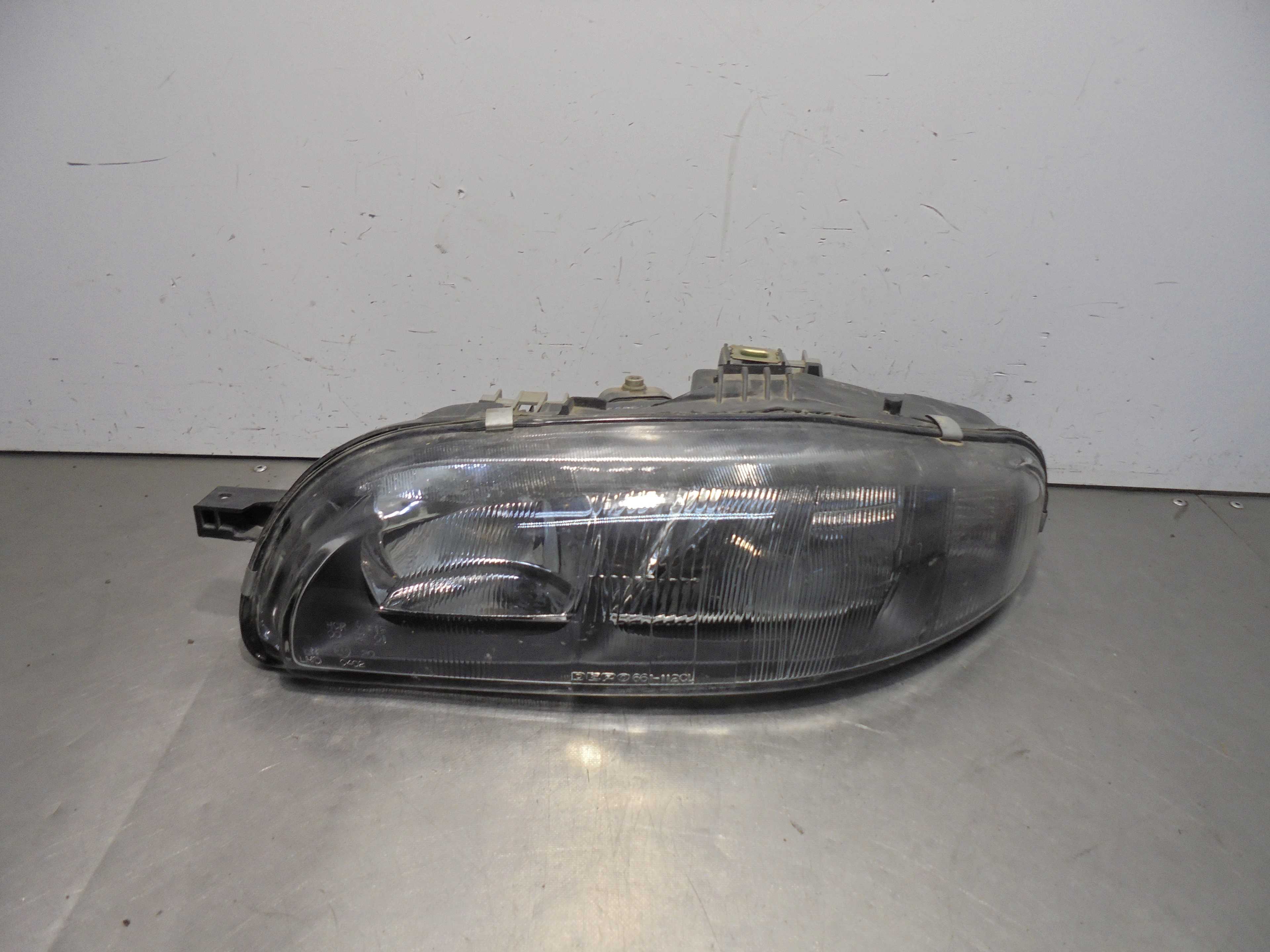 Recambio de faro izquierdo para fiat brava (182) 1.9 jtd cat referencia OEM IAM 6611120L DEPO 