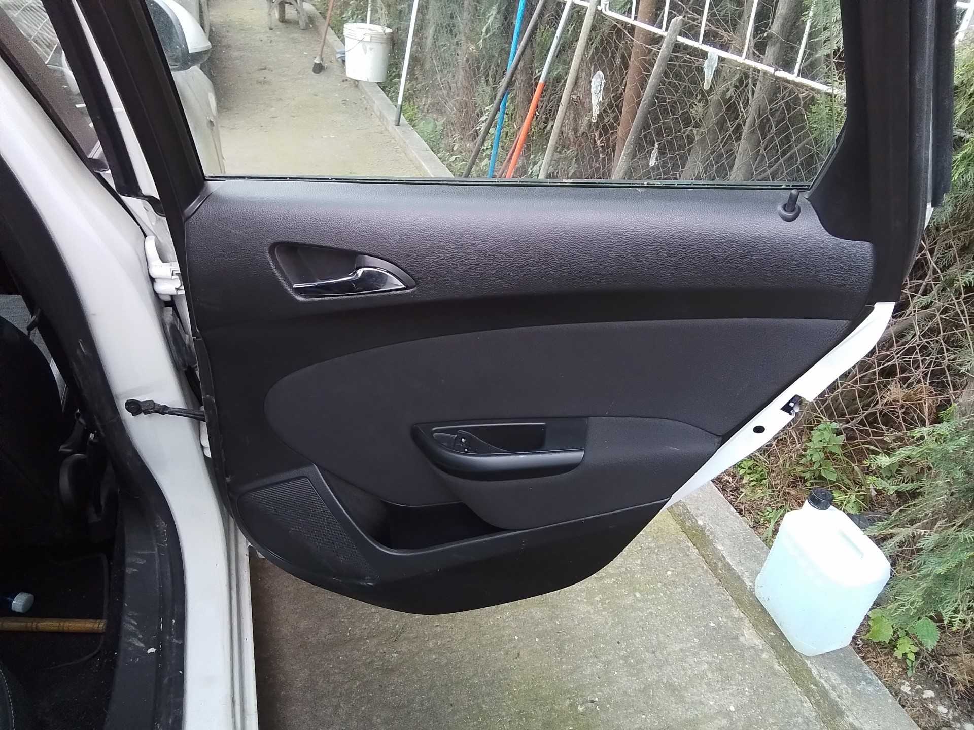 Recambio de guarnecido puerta trasera derecha para opel astra j lim. excellence referencia OEM IAM   