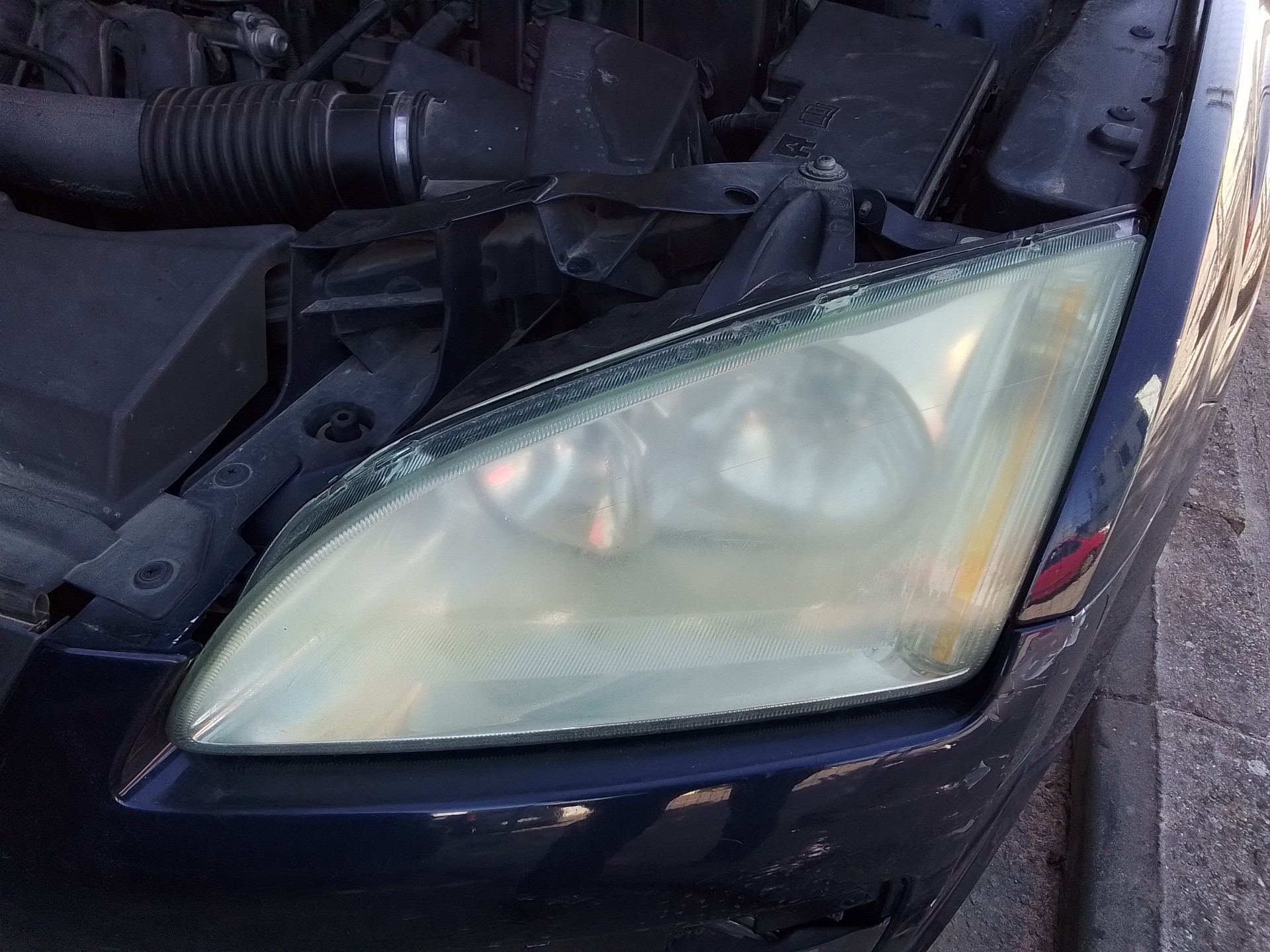 Recambio de faro izquierdo para ford focus berlina (cap) ghia referencia OEM IAM   