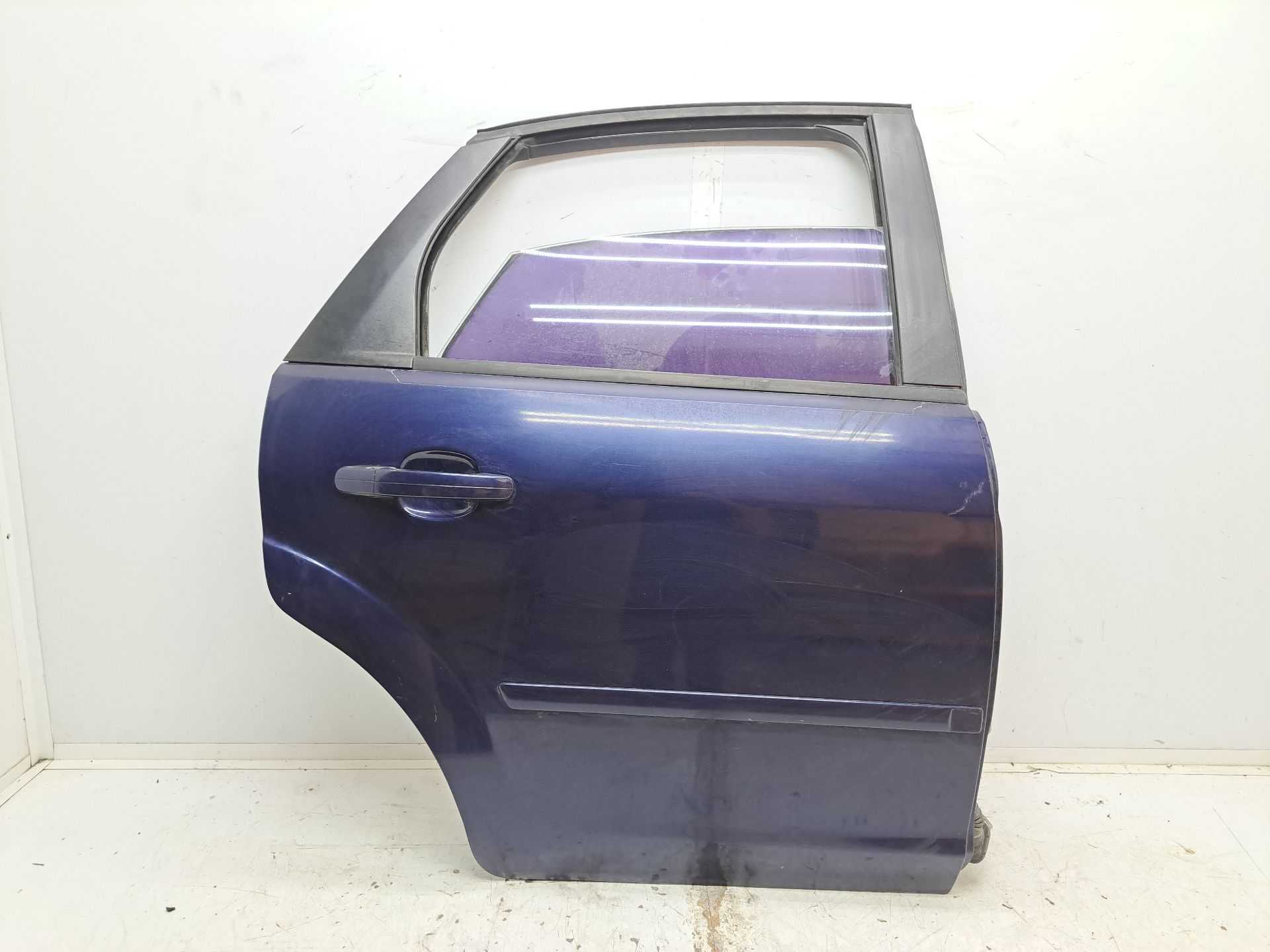 Recambio de puerta trasera derecha para ford focus berlina (cap) ghia referencia OEM IAM   