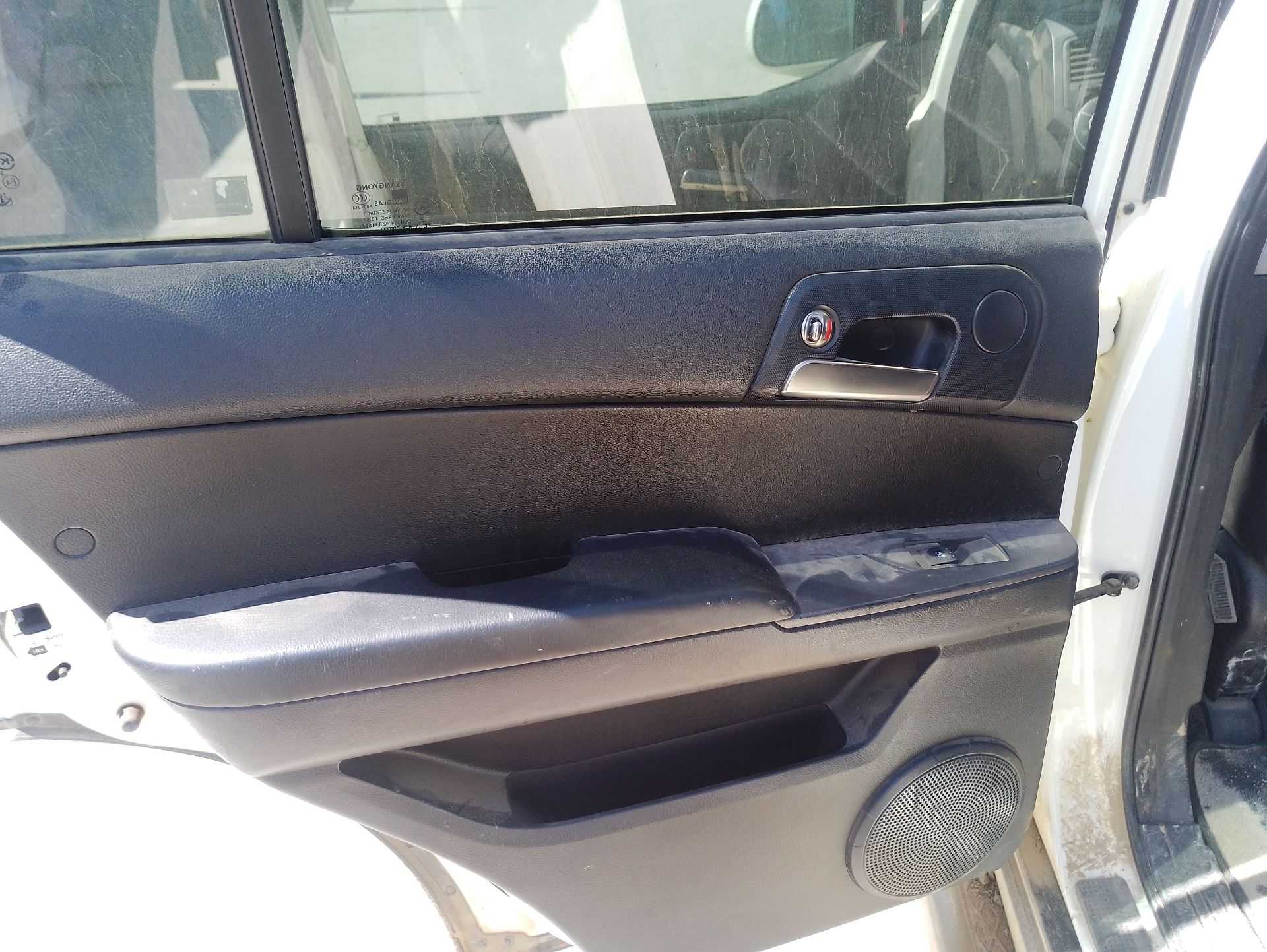 Recambio de guarnecido puerta trasera izquierda para ssangyong kyron 2.0 xdi referencia OEM IAM   