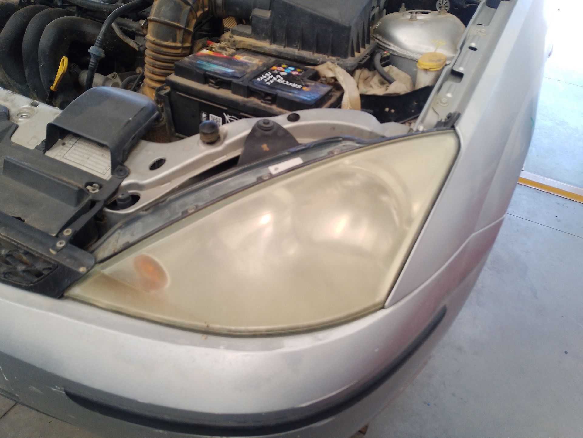 Recambio de faro izquierdo para ford focus i sedán (dfw) 1.6 16v referencia OEM IAM 1152091  