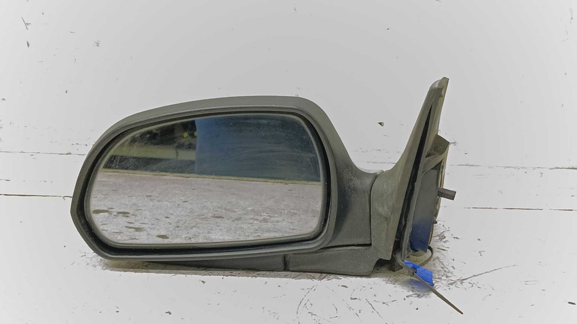 Recambio de retrovisor izquierdo para kia shuma ii 1.6 cat referencia OEM IAM E4012151  