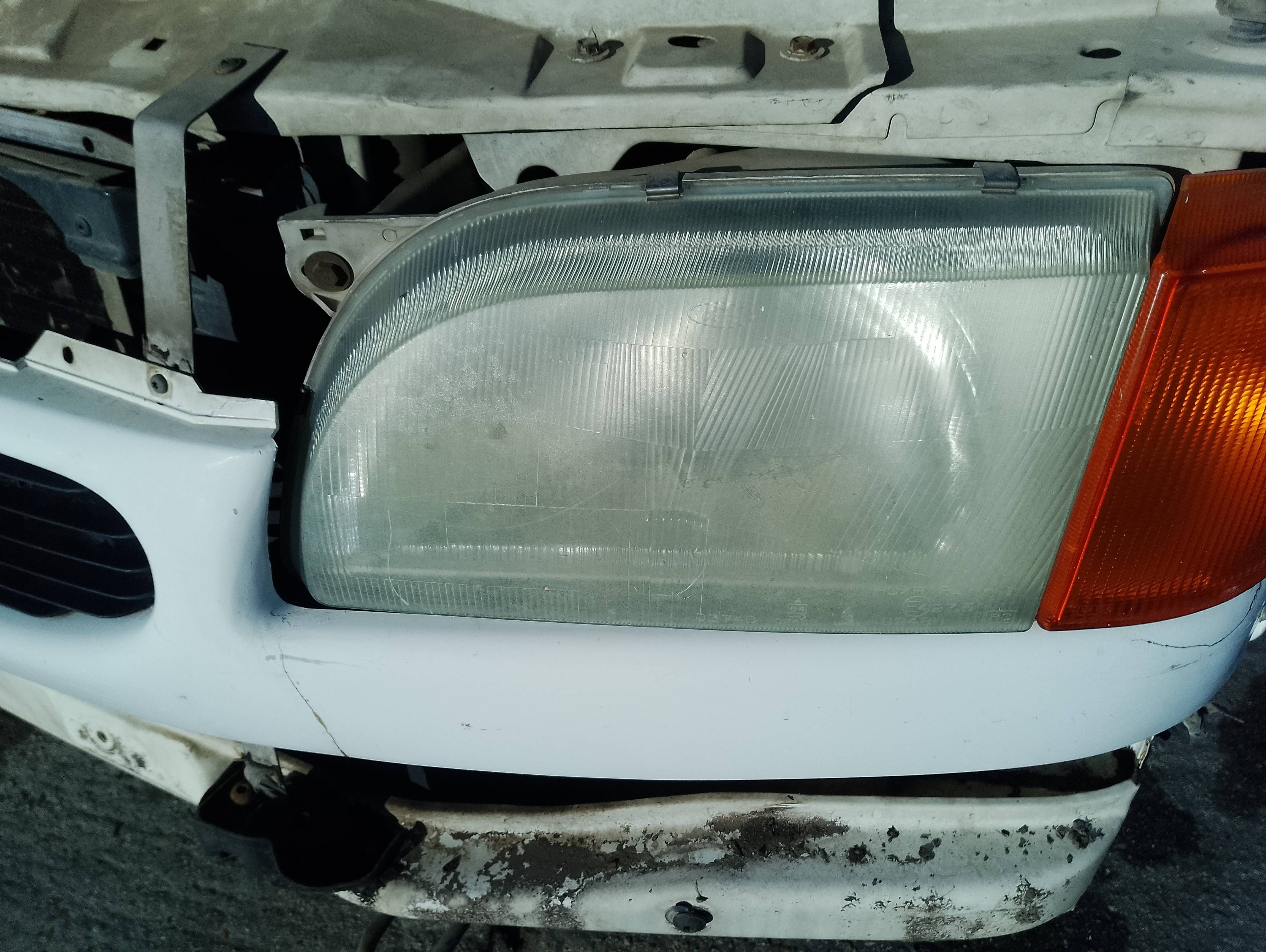 Recambio de faro izquierdo para ford transit ft 100 largo referencia OEM IAM   