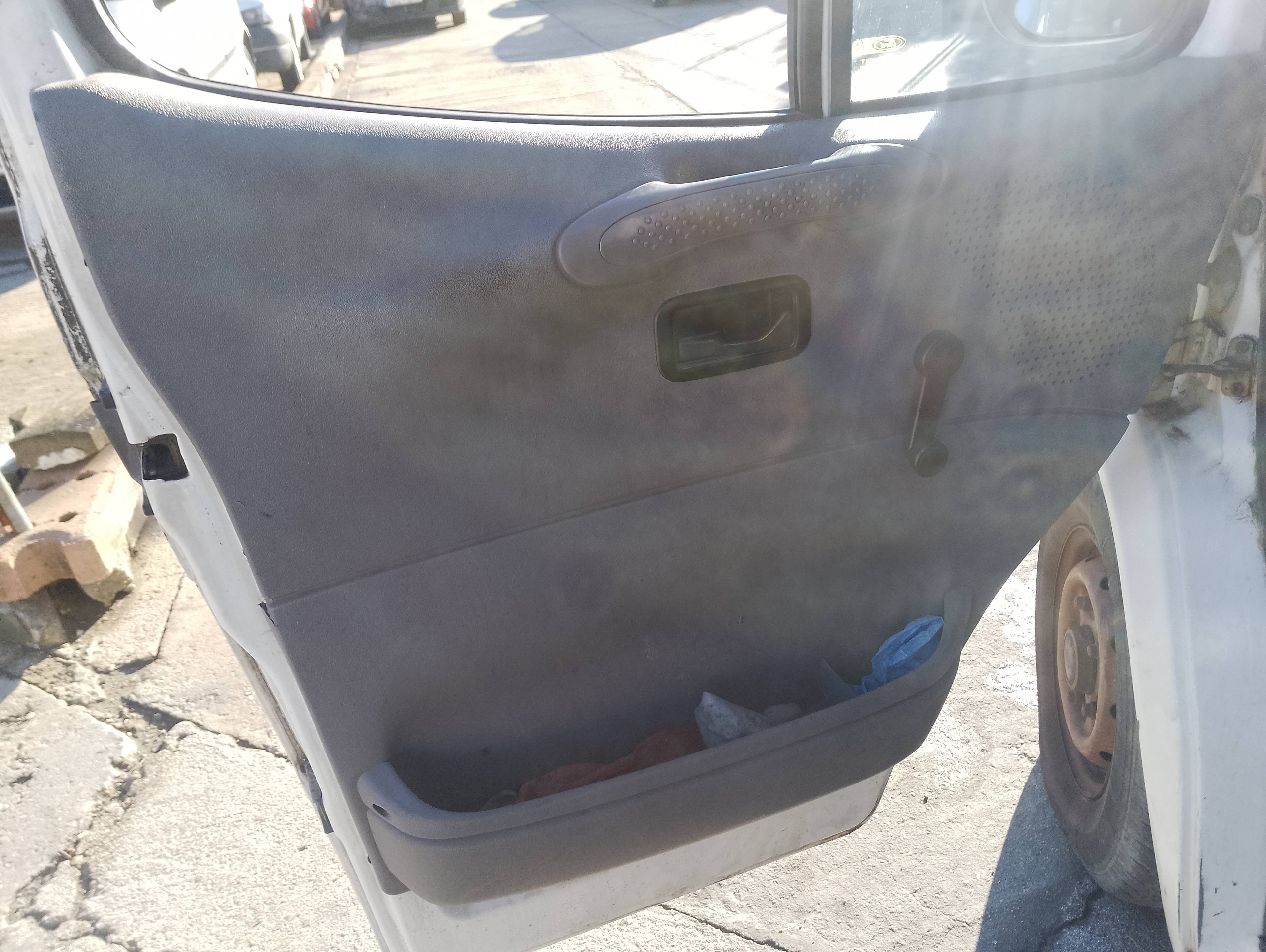 Recambio de guarnecido puerta delantera izquierda para ford transit ft 100 largo referencia OEM IAM   