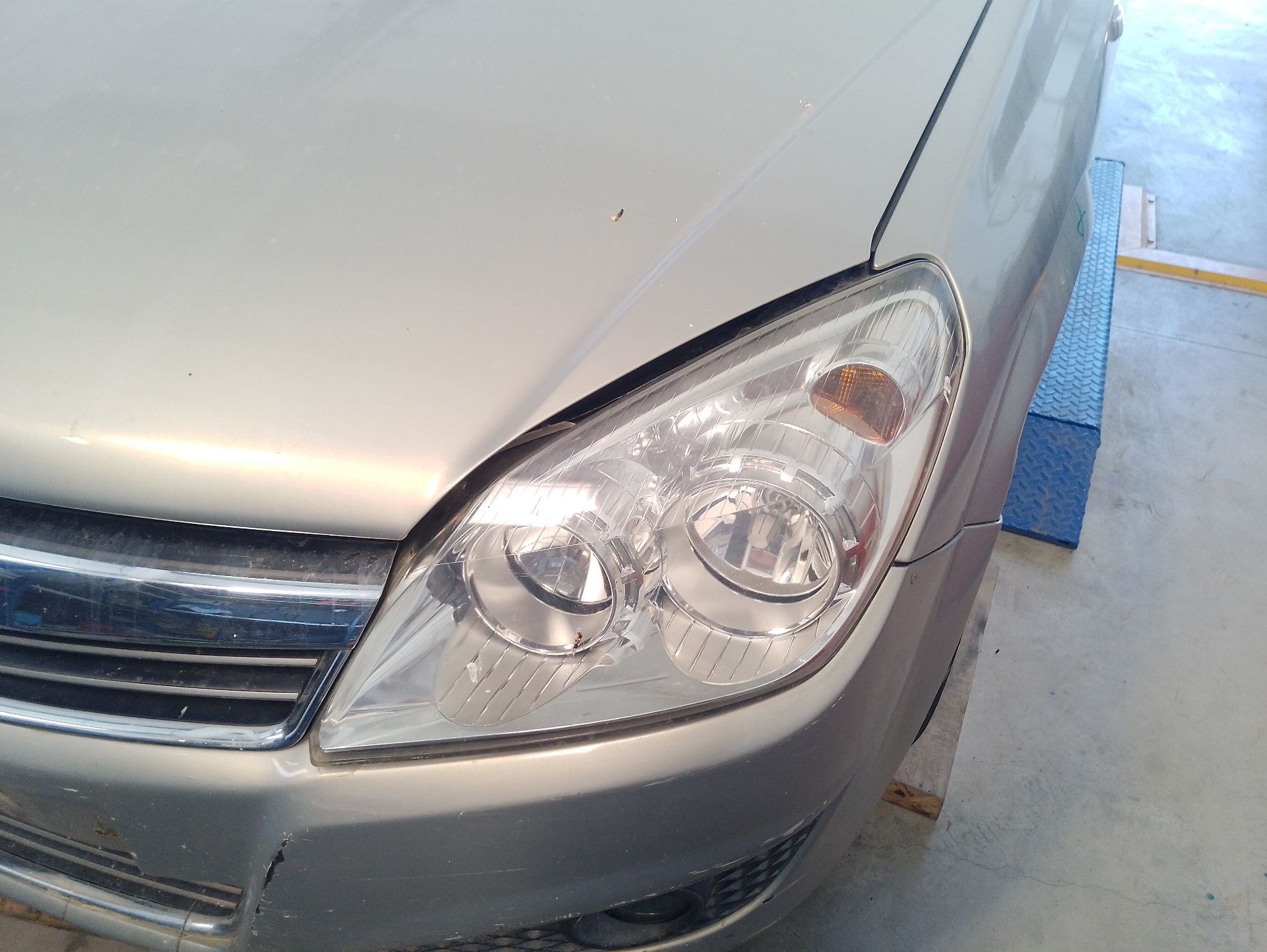 Recambio de faro izquierdo para opel astra h station wagon (a04) 1.9 cdti (l35) referencia OEM IAM 93190069  