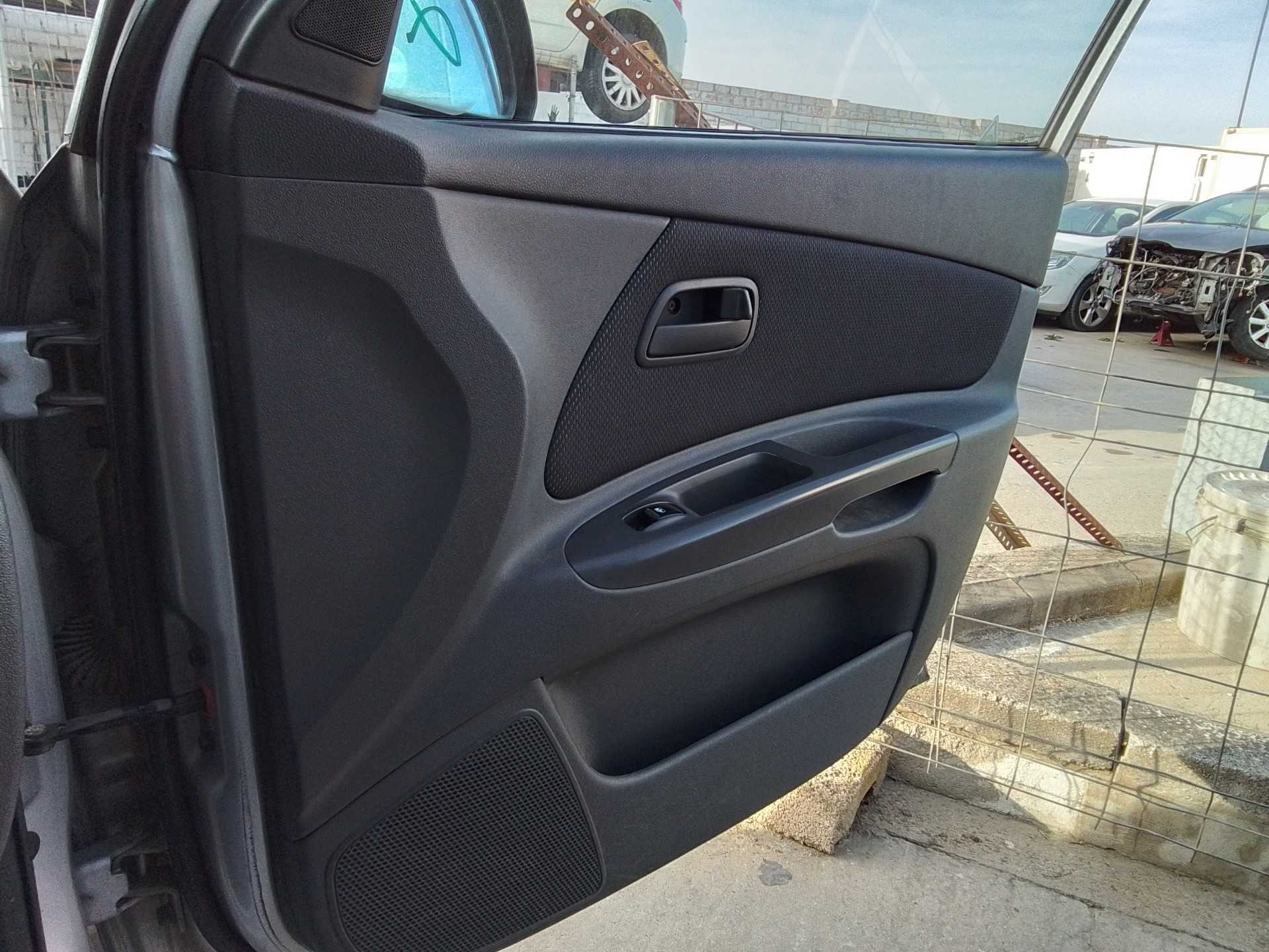 Recambio de guarnecido puerta delantera derecha para kia rio 1.4 cat referencia OEM IAM   