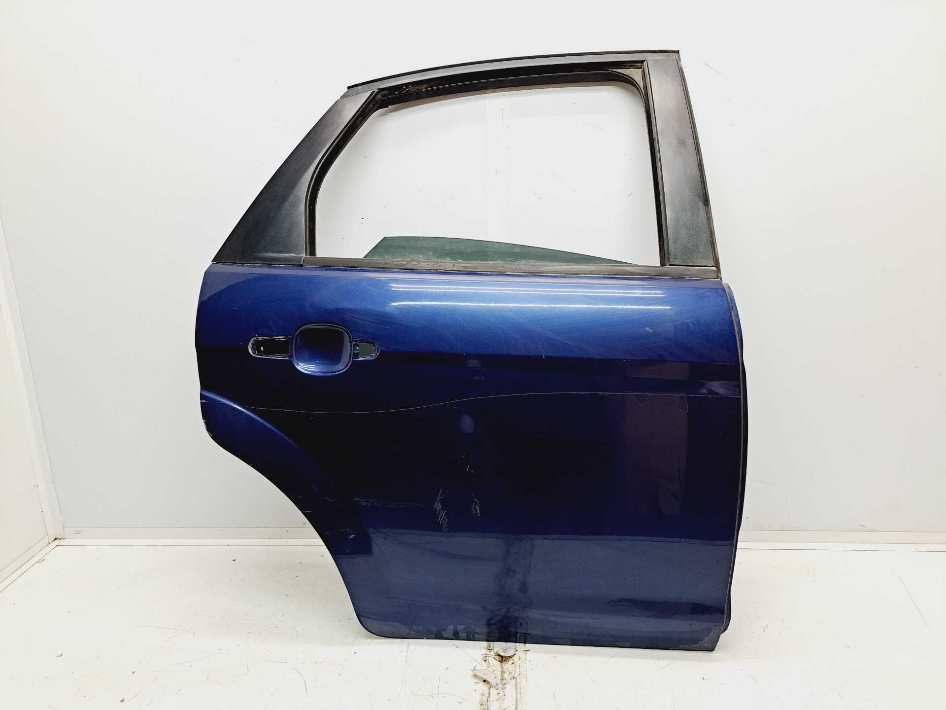 Recambio de puerta trasera derecha para ford focus berlina (cap) 1.6 tdci cat referencia OEM IAM   