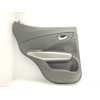 Recambio de guarnecido puerta trasera izquierda para ssangyong tivoli crystal 4x2 referencia OEM IAM 732103500  