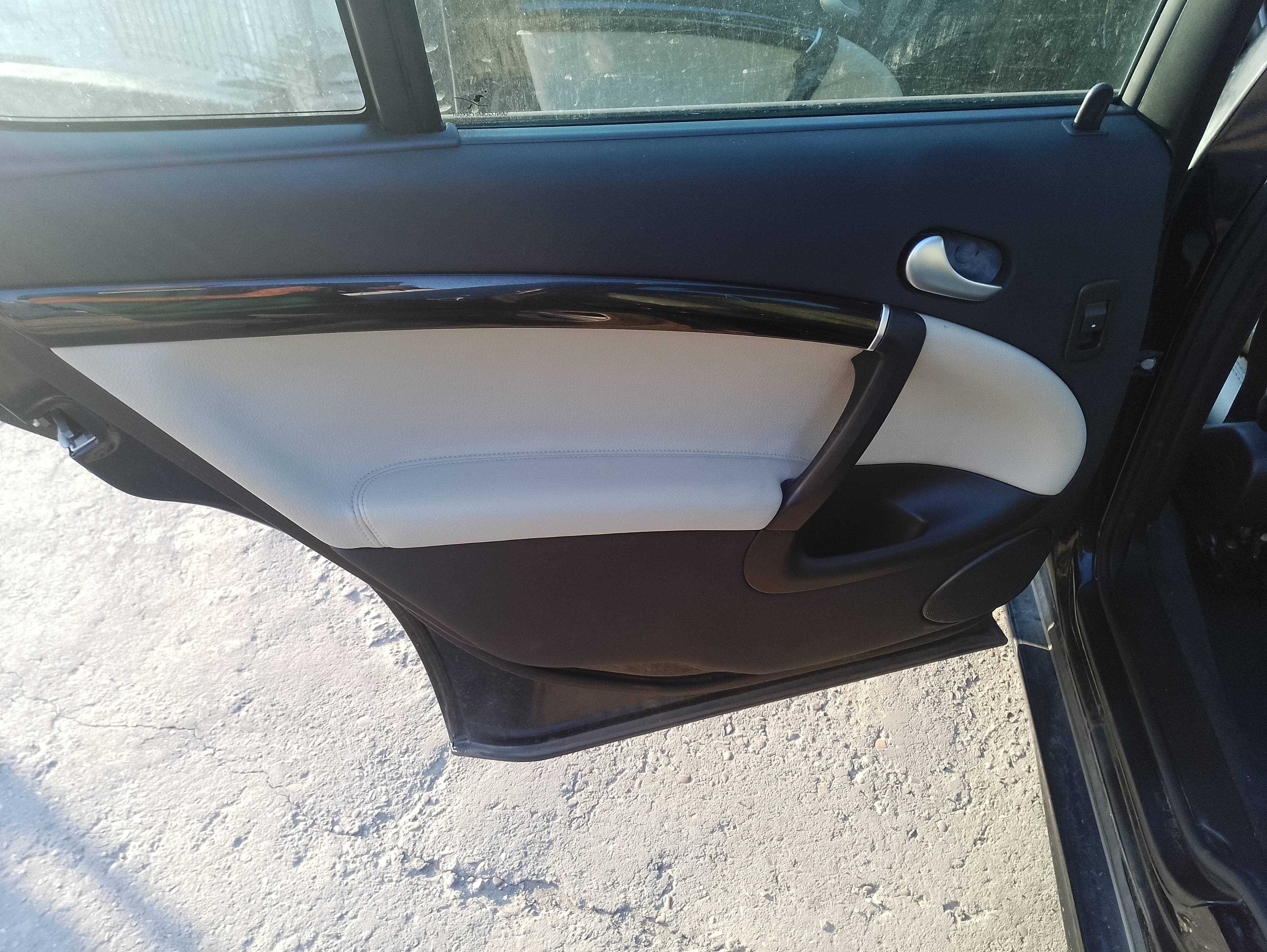 Recambio de guarnecido puerta trasera izquierda para saab 9-5 berlina 1.9 tid linear sport referencia OEM IAM   