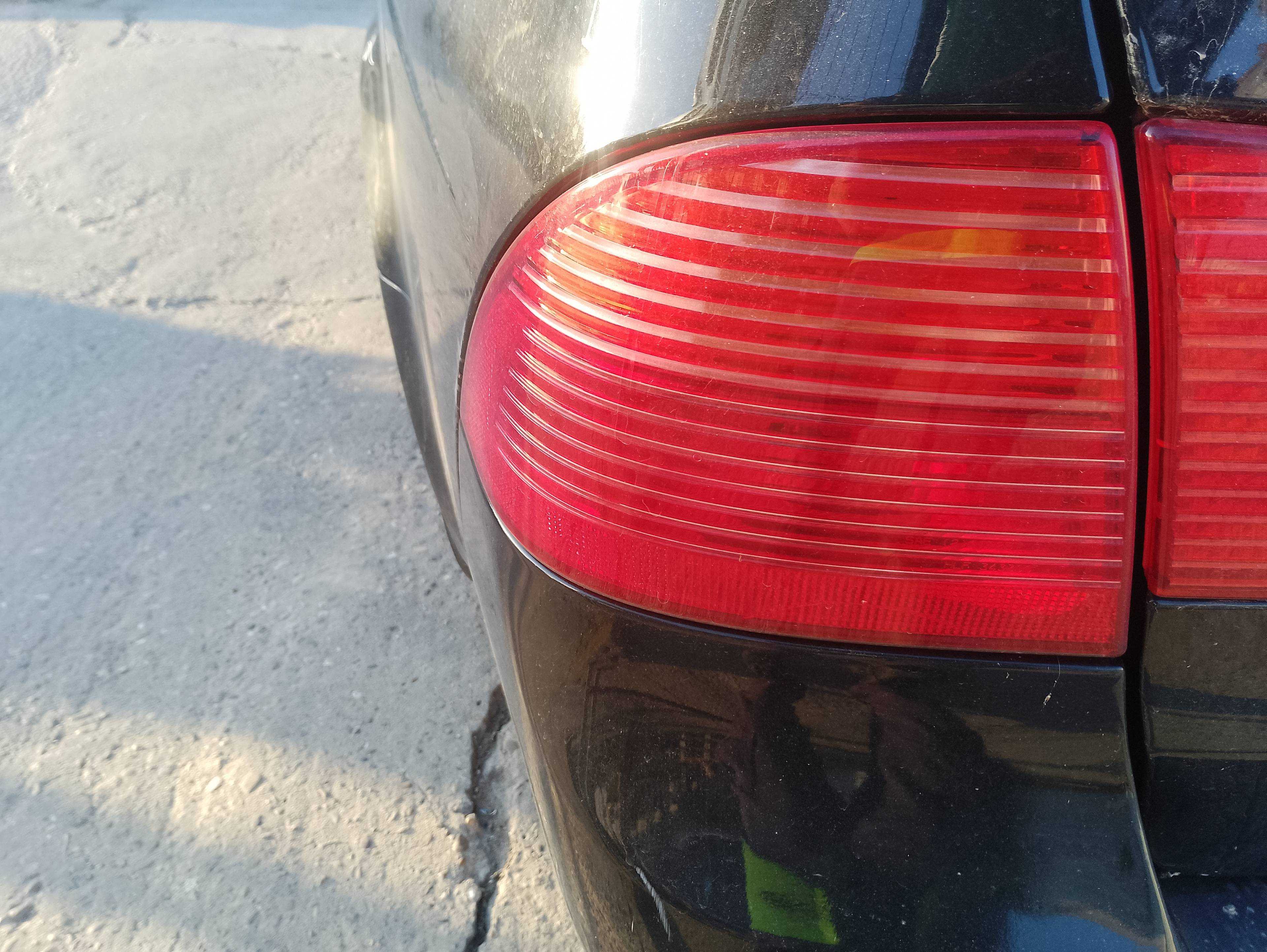 Recambio de piloto trasero izquierdo para saab 9-5 berlina 1.9 tid linear sport referencia OEM IAM   